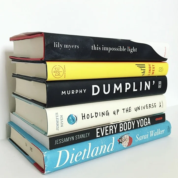 COC book club stack of books (1).jpg