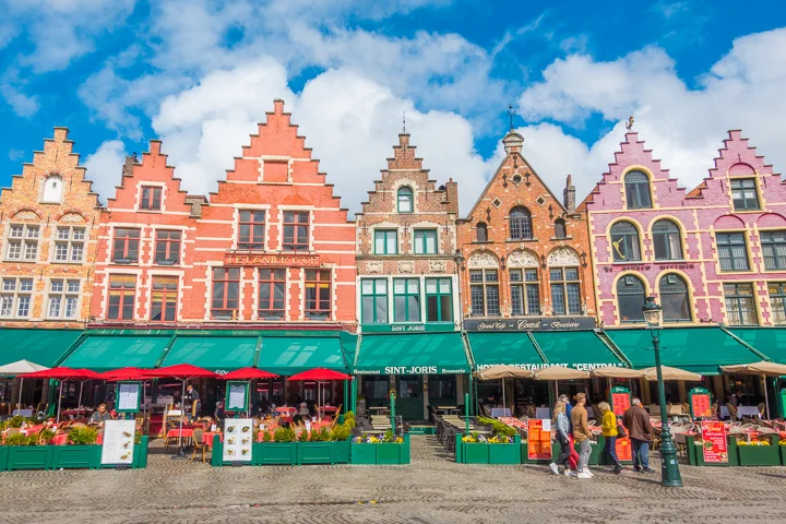 Bruges - All of the restaurants have seating areas outside facing the center of the square. Perfect way to take in the city + culture!