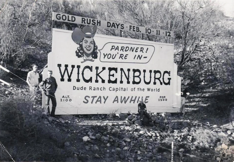 Julie Brooks, the chamber’s executive director, provided a starting point. She sent over a photo of a much older billboard (above), a lively example of traditional southwestern design. With the historic photo as inspiration, the new sign began to take shape. Now installed along the highway into town, the new billboard (below) serves as a contemporary calling card for Wickenburg, combining updated content with the classic aesthetics of the old West.