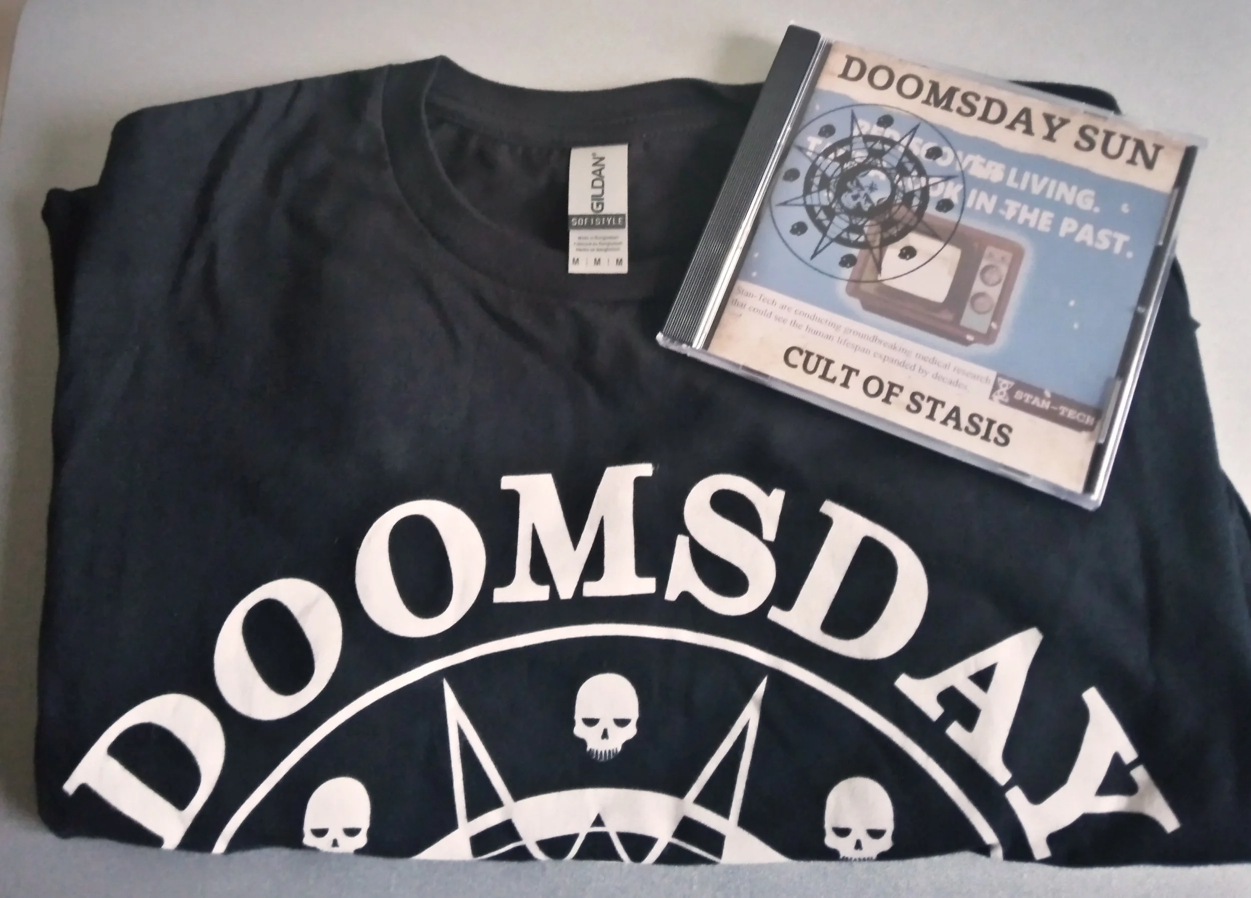 T-SHIRTS AND CDS NOW AVAILABLE TO ORDER ONLINE: POSTAL WORKERS PREPARE HAZMAT SUITS
