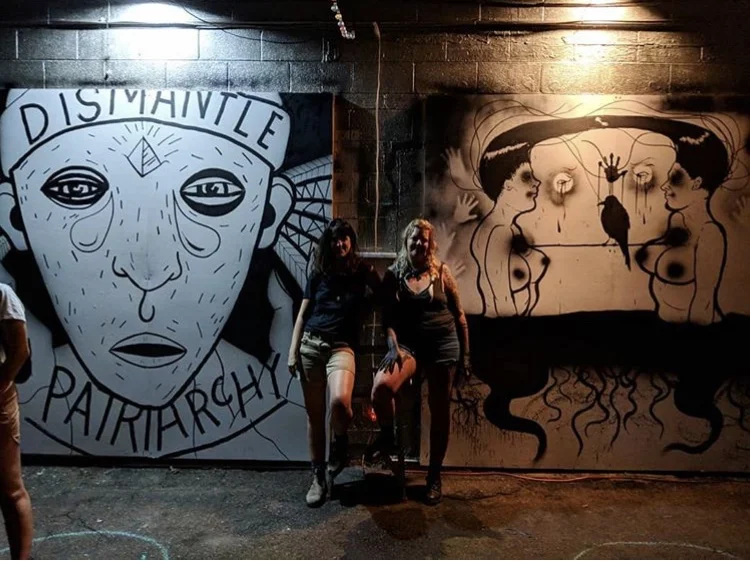 finished! Alli and I standing by our respective pieces