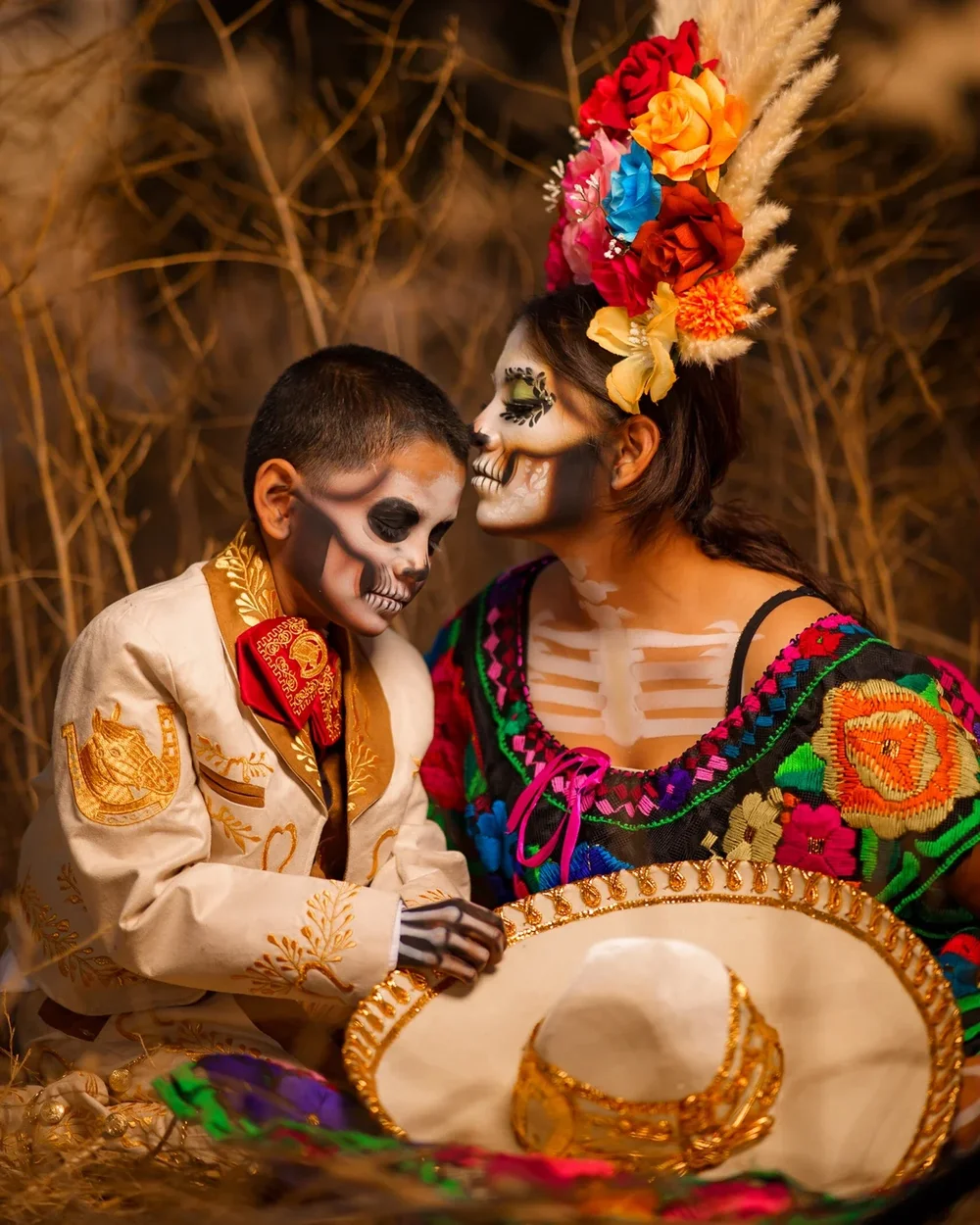 Family participants in colorful Catrina and Catrin attire