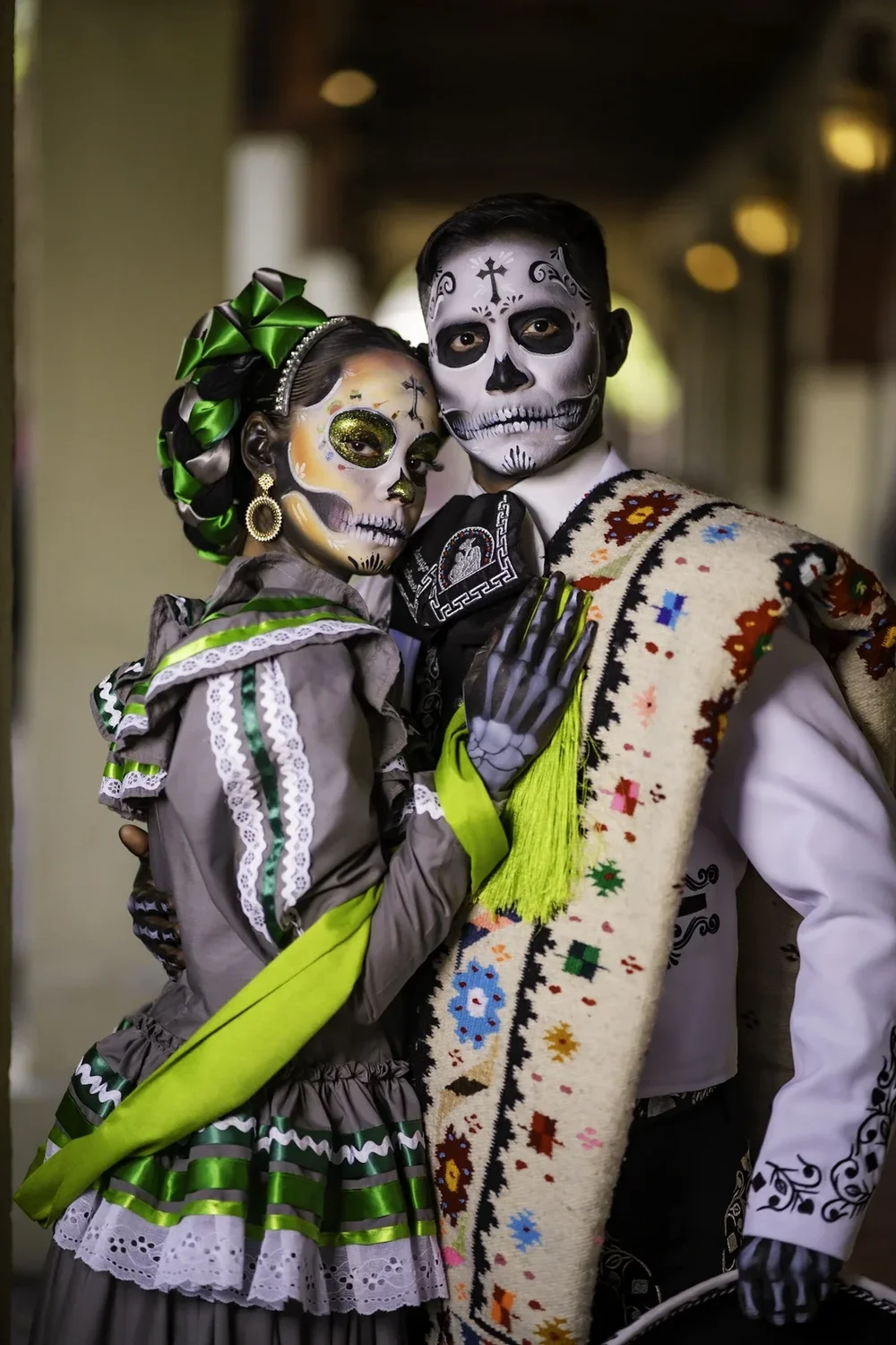 Couple in coordinated Catrina and Catrin attire