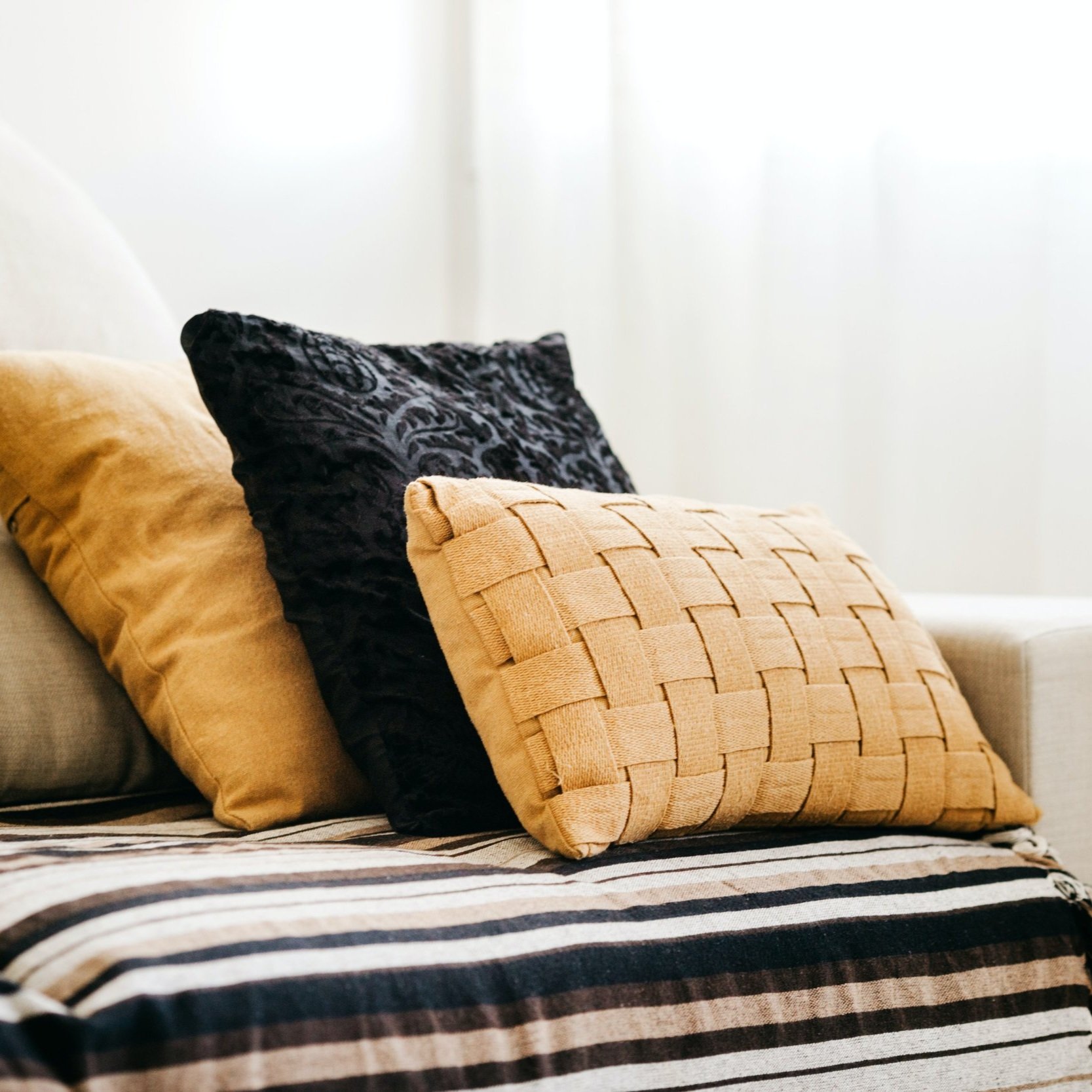 add fall themed pillows to update your home for fall