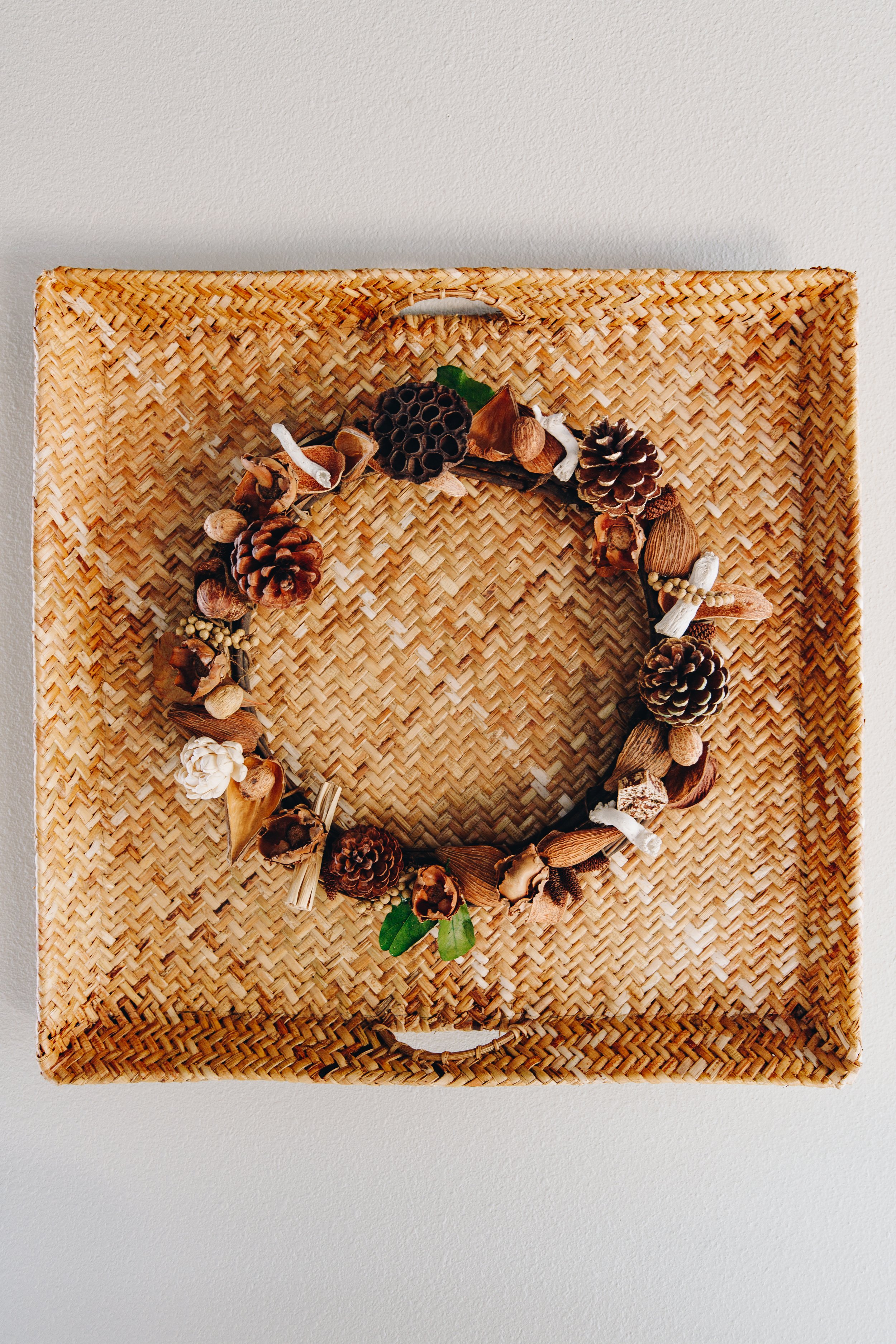 scented wreath with potpourri on a basket as a frame for fall home decor