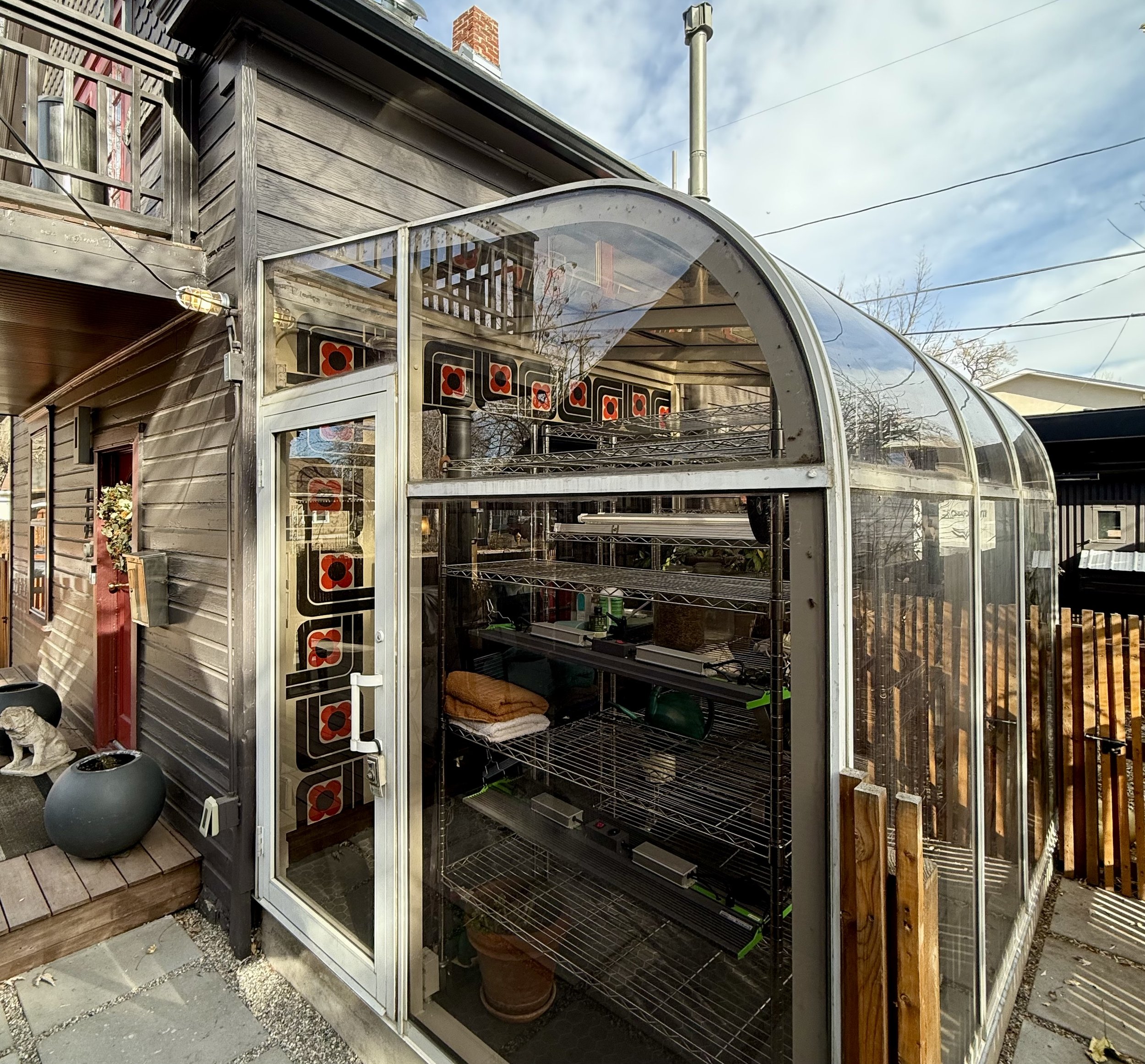 Greenhouse mural flanking French doors (exterior view), private residence, Denver, CO, 2025