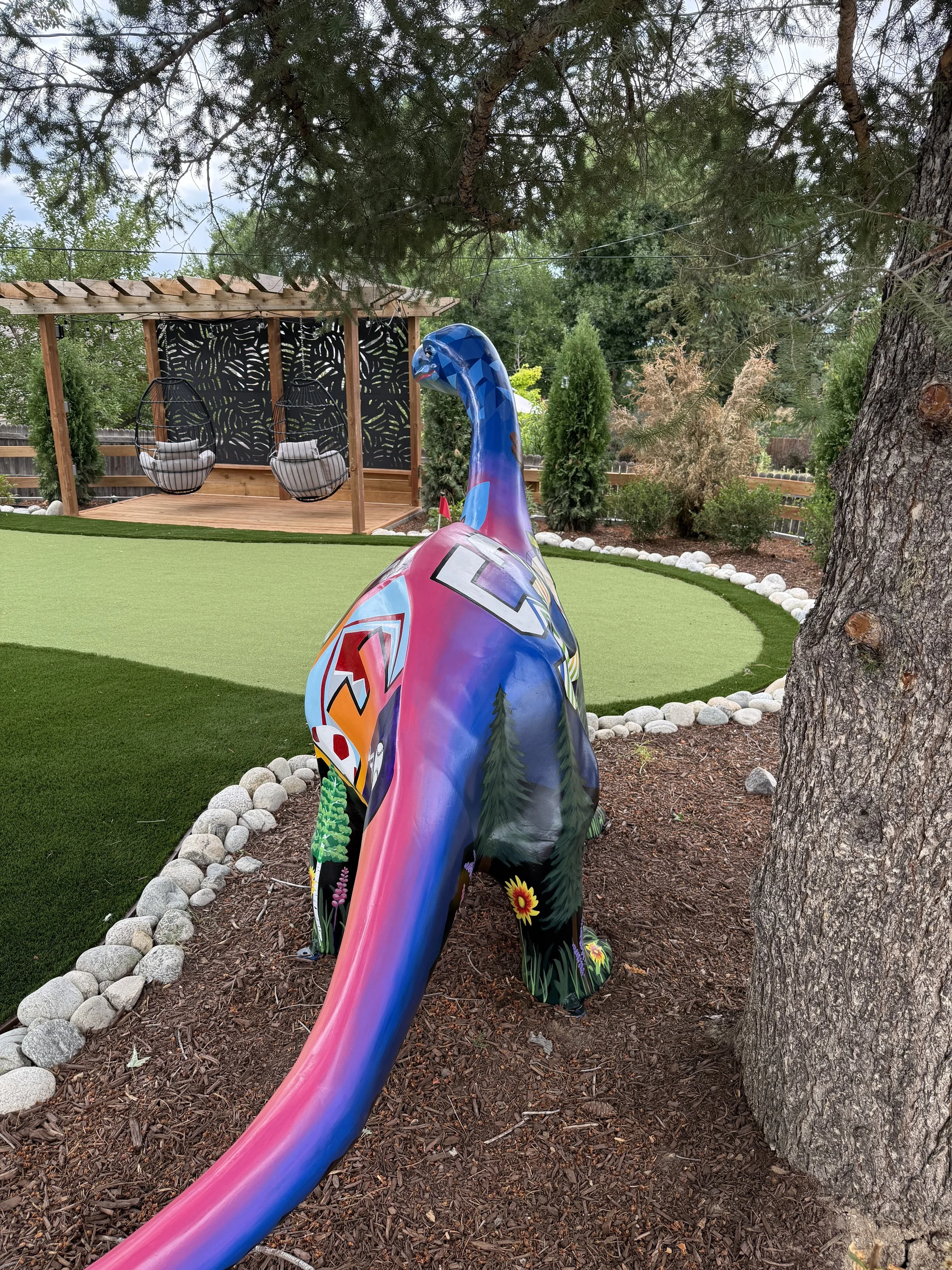 'Denver Dino' painted dinosaur, 6.5'h x 11'l x 2.5'w, AirBnB property, Centennial CO, 2025