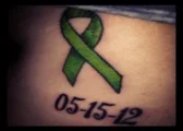 Nicole wears a reminder of her kidney donation day.