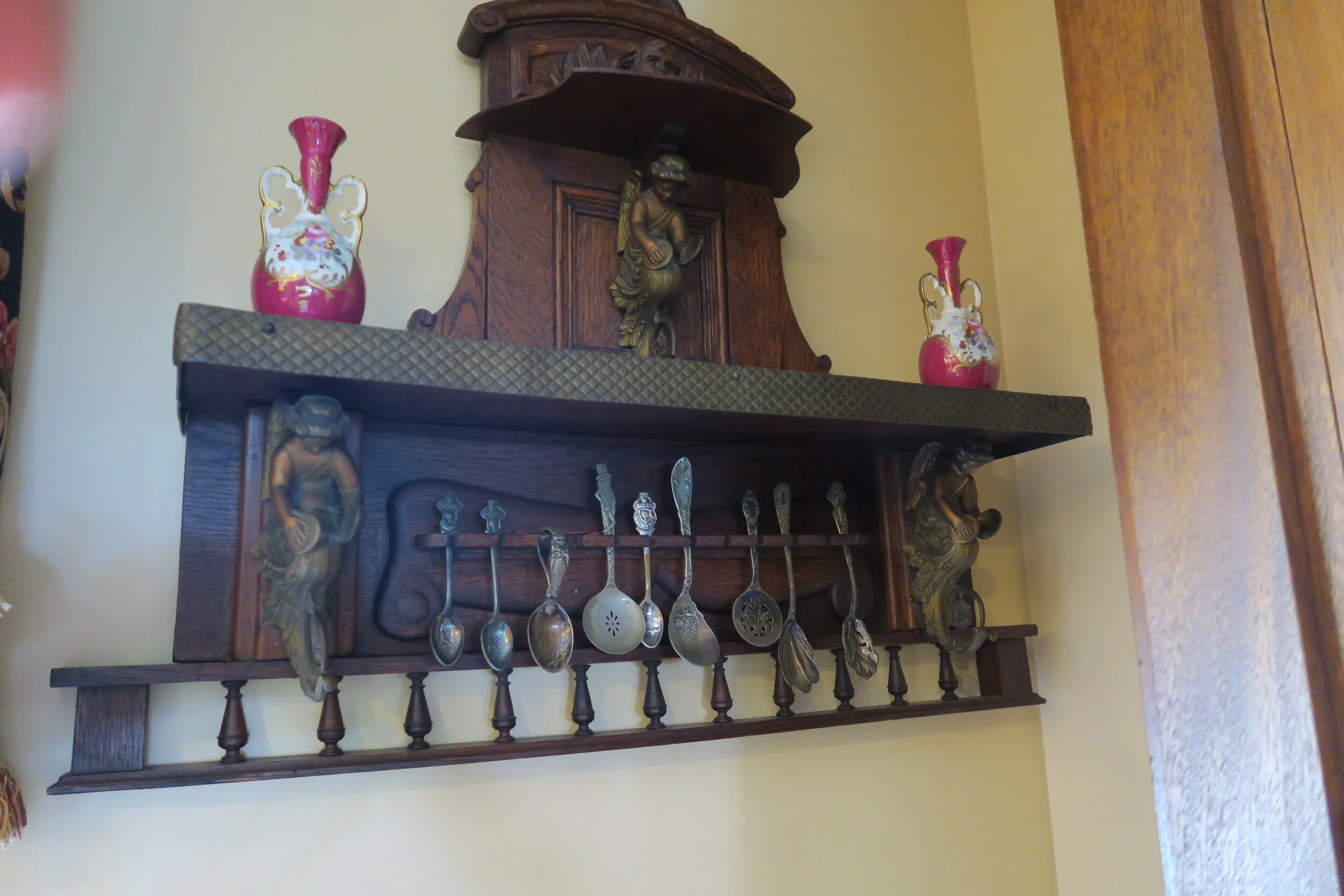 Grouping Including Carved Spoon Rack, Silver-Plated Spoons, and Two English Vases
