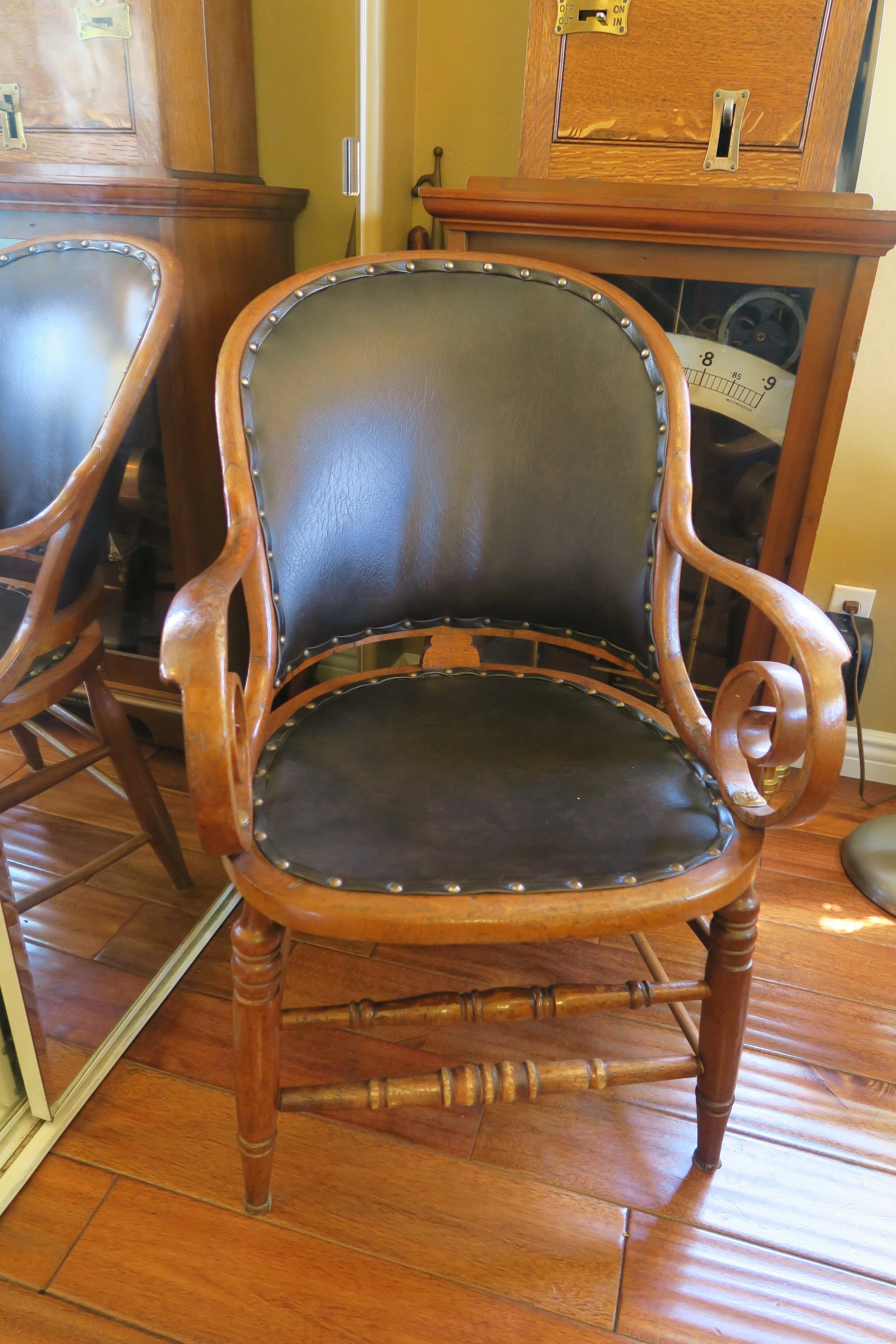 Heywood Brothers Oak Armchair with Black Vinyl Seat