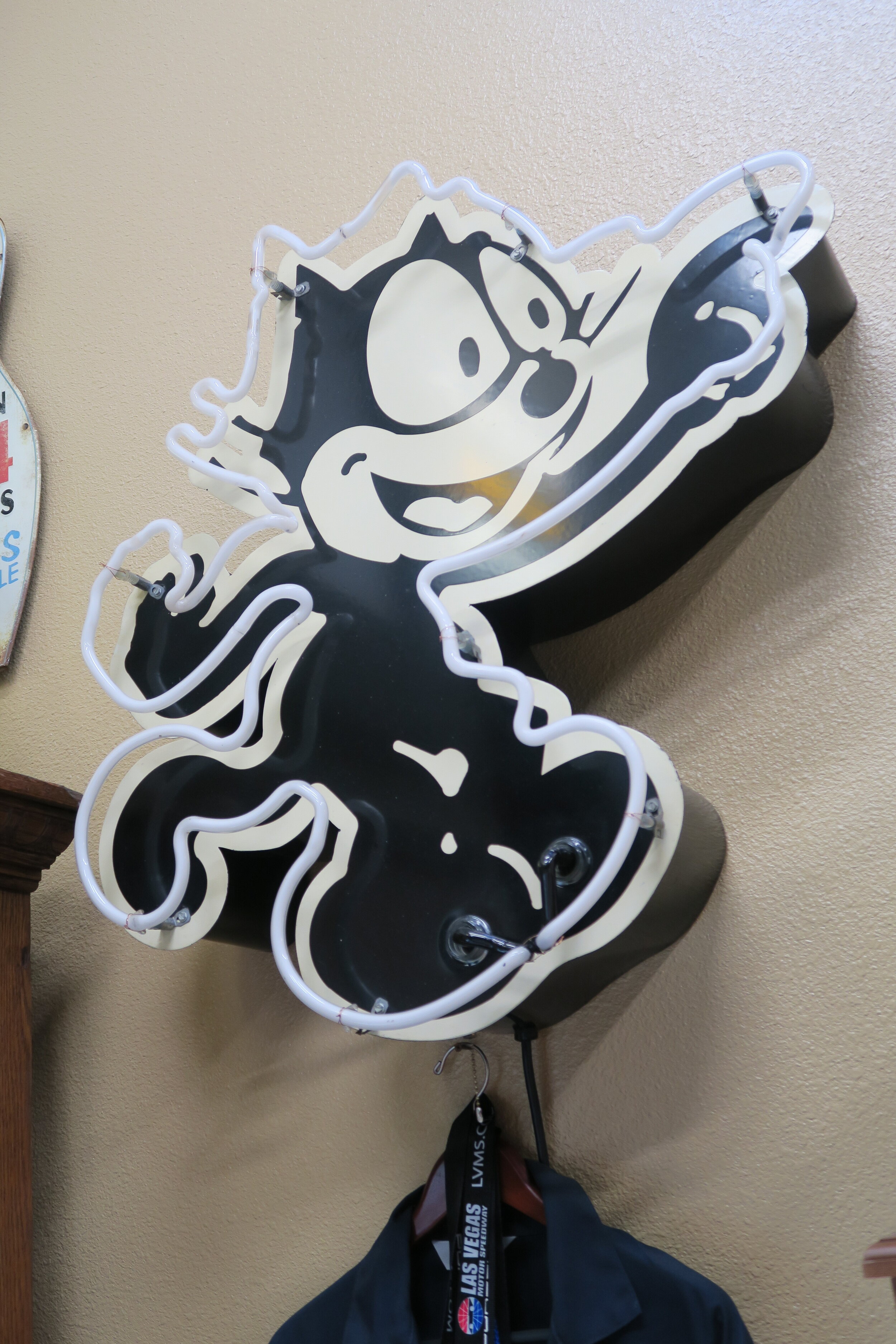 Felix Neon and Custom Steel Enamel Sign