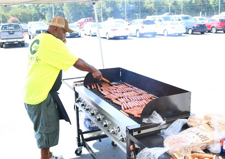 Greenville Auto Auction grilled up hot dogs for all the dealers attending its Red, White and Blue sale in July.