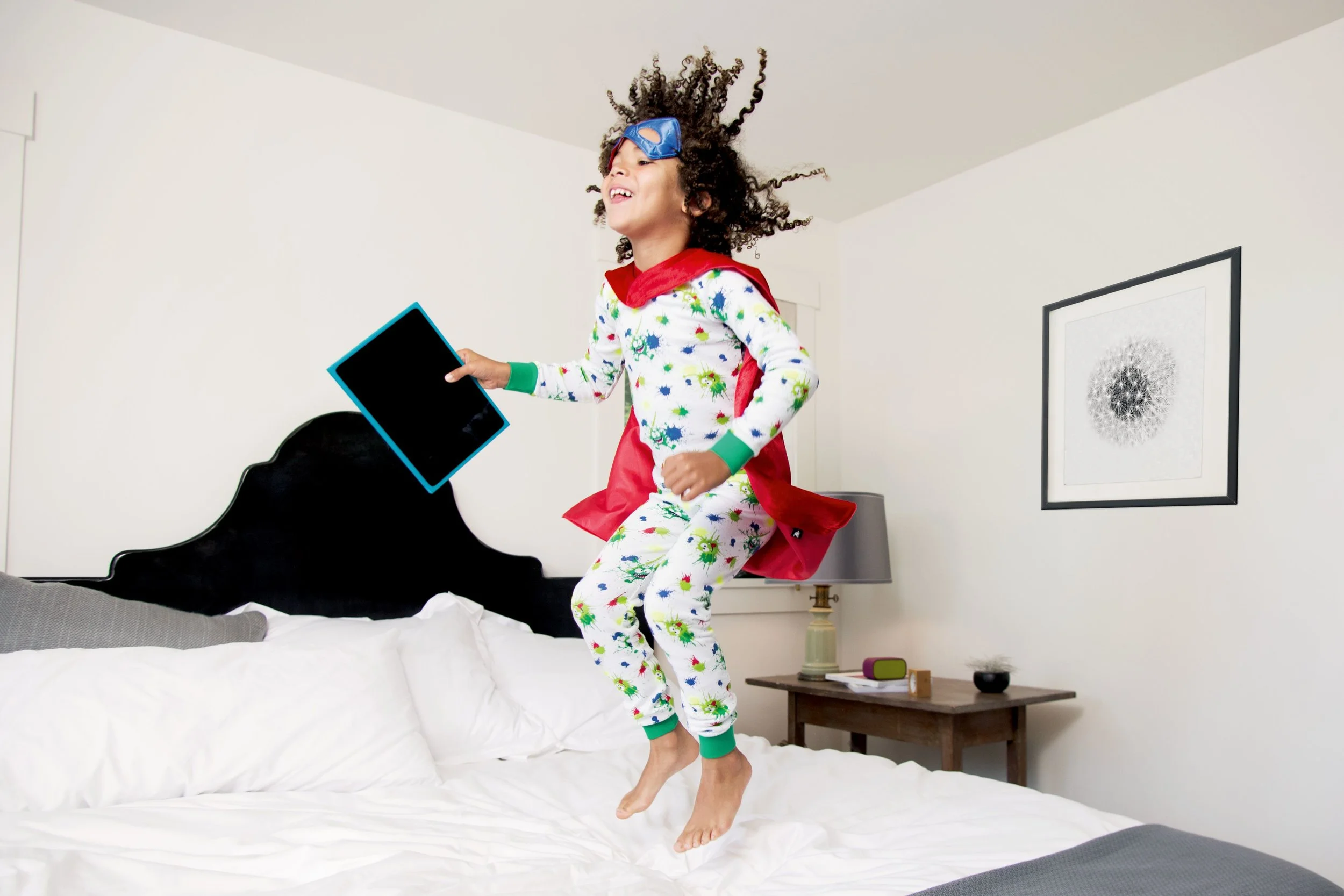 2015-05_charlie nucci_logitech_jumping on bed.jpg