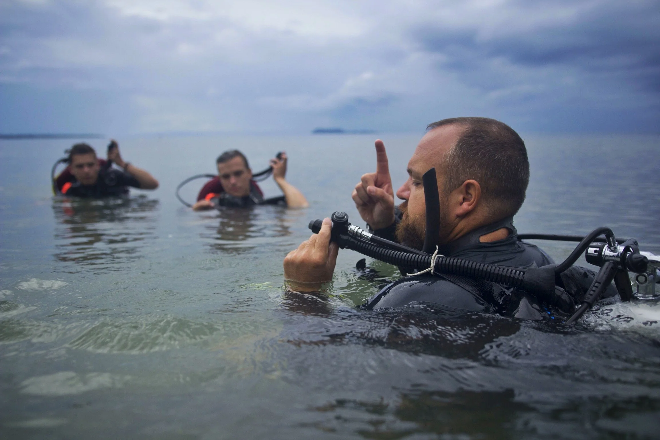 Divers on the sea surface