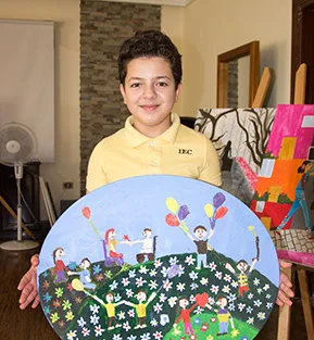 Khaled, a young Syrian refugee, receives expressive art therapy at the Al Bader Center in Amman, Jordan.