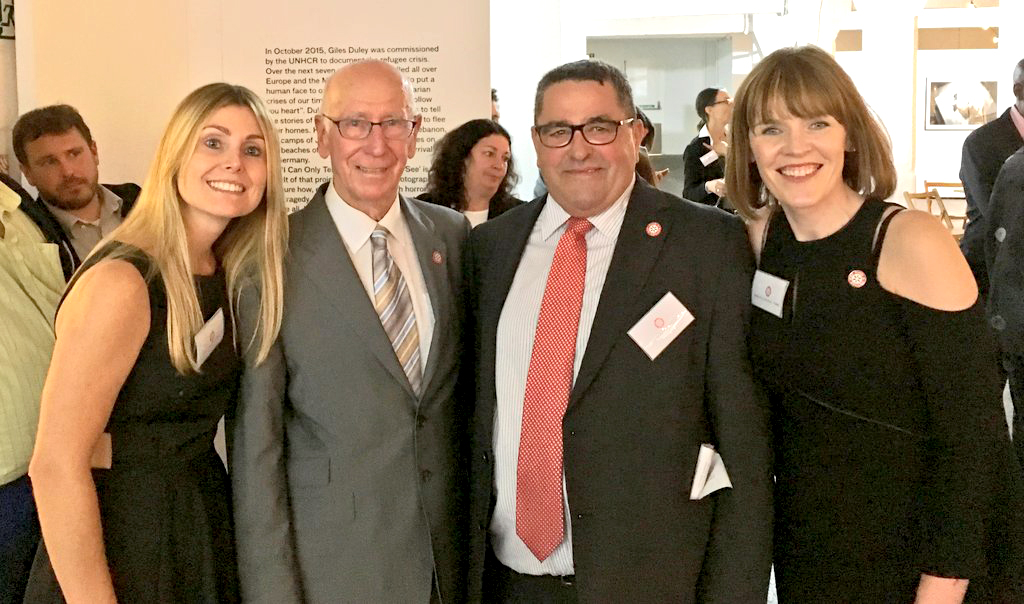 Find A Better Way founder Sir Bobby Charlton with CEO Lou McGrath and Staff