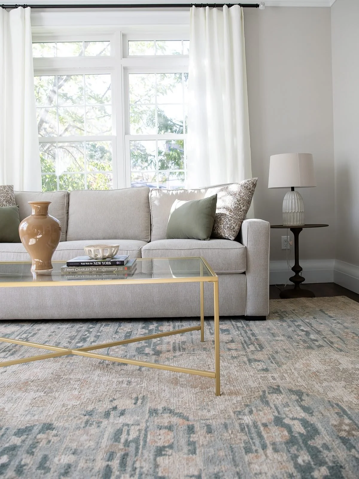 I was so happy to hear from a longtime client who reached out about refreshing her living room. We swapped out almost everything in the space and it truly feels like a brand new room.  And the best part is that she said her family actually uses this 