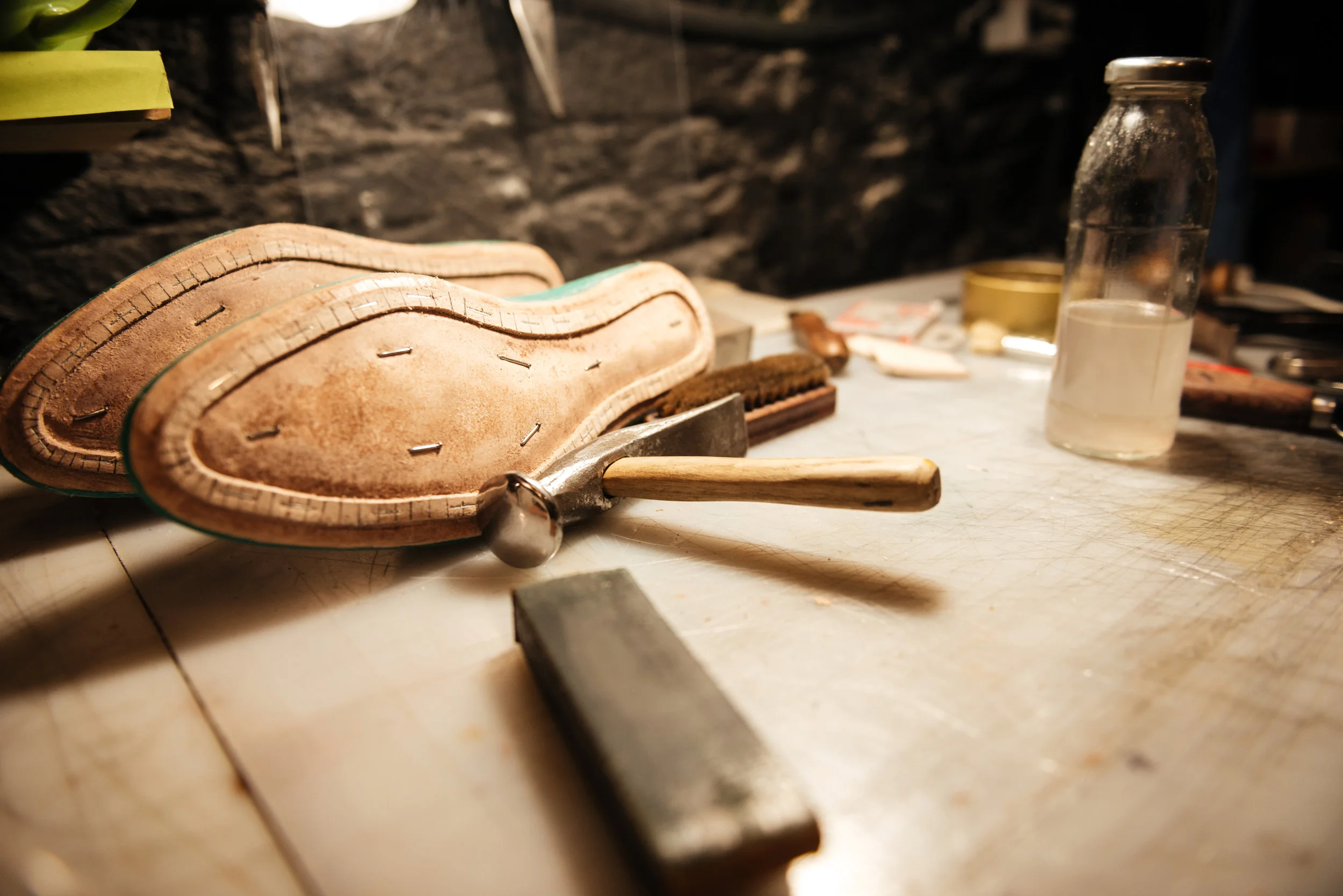shoes-on-table-at-footwear-workshop-PZY395E.jpg