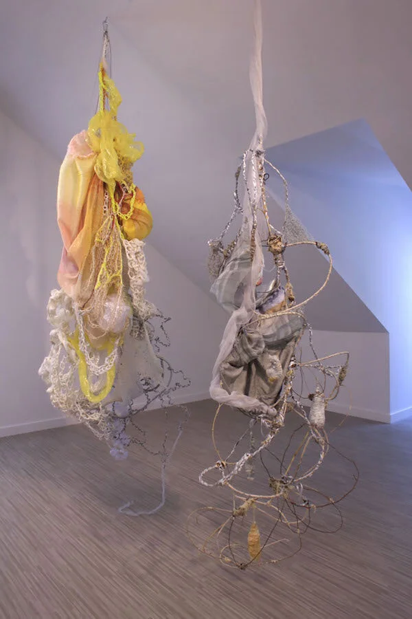 Lay Bare and Breathing Room | Weaving, bamboo, twine, jute, monofilament, conduit, paper ribbon, and shrink-wrap | 2019