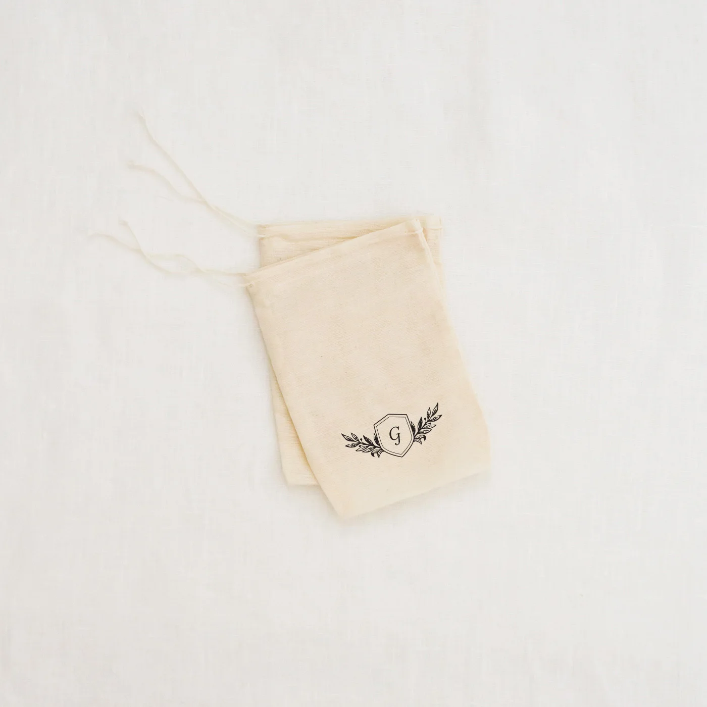 pair-monogram-return-address-gift-bag-stamp-napkin-simple.jpg