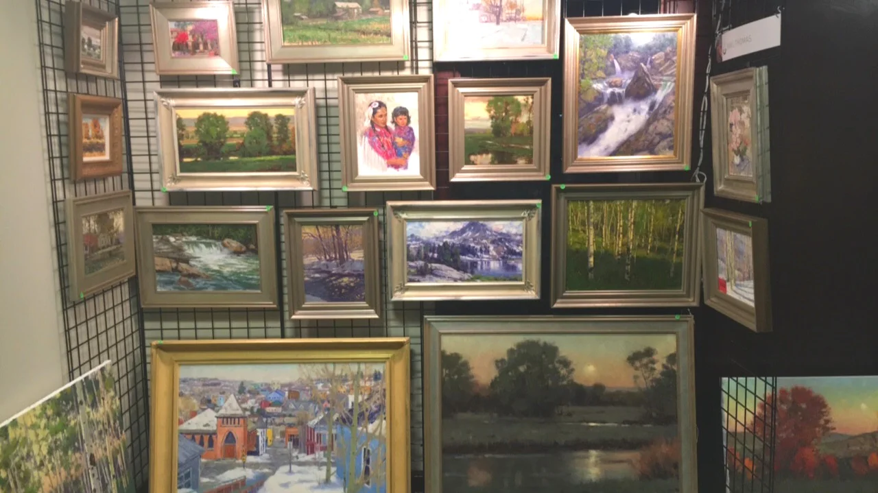 SEVERAL WORKS ON DISPLAY BY KARL THOMAS AT THE ZIONS BANK ART SHOW