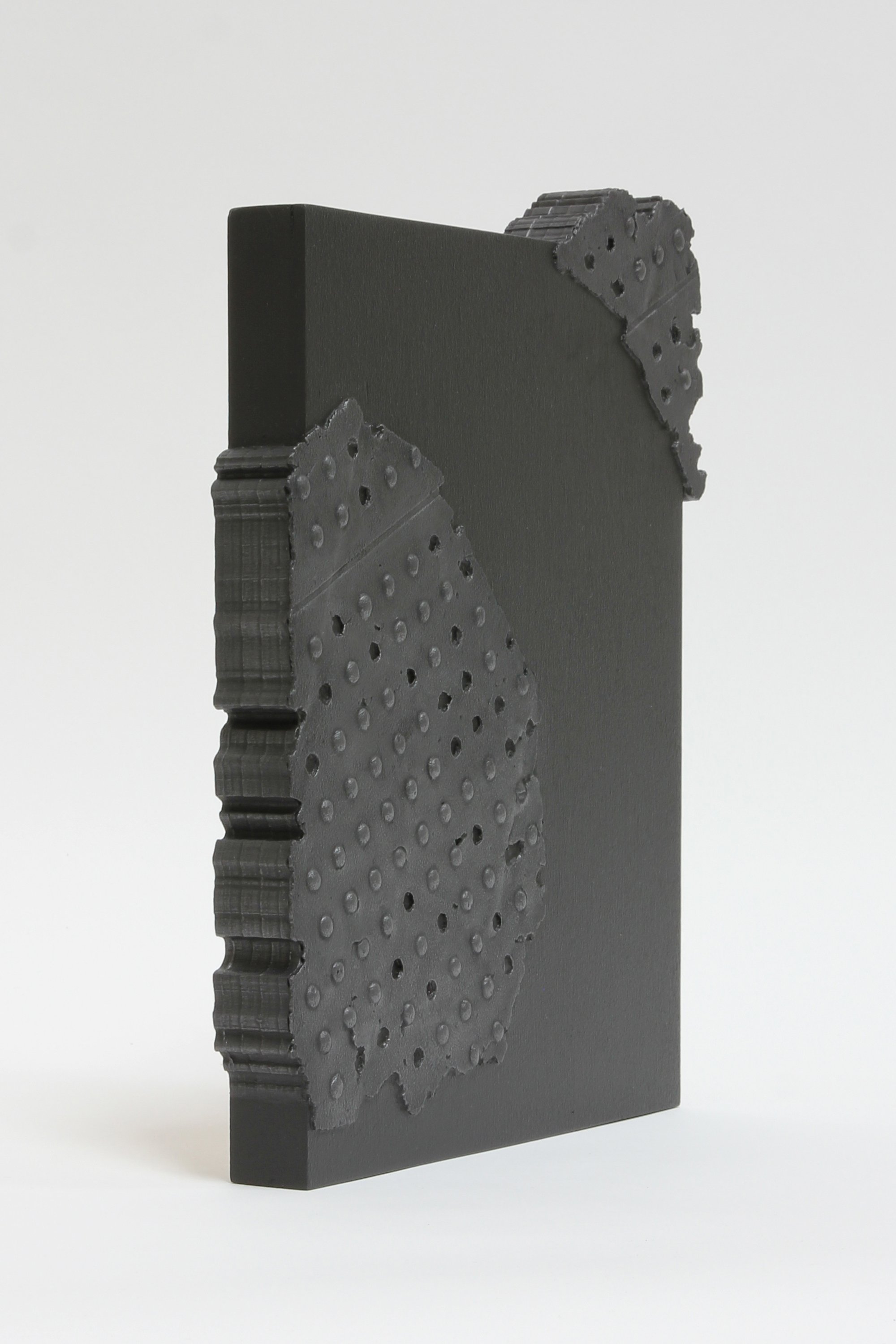   Dark Split  Found rubber, acrylic, graphite, adhesive and varnish on panel 11.5” x 9” x 1” / 2022 