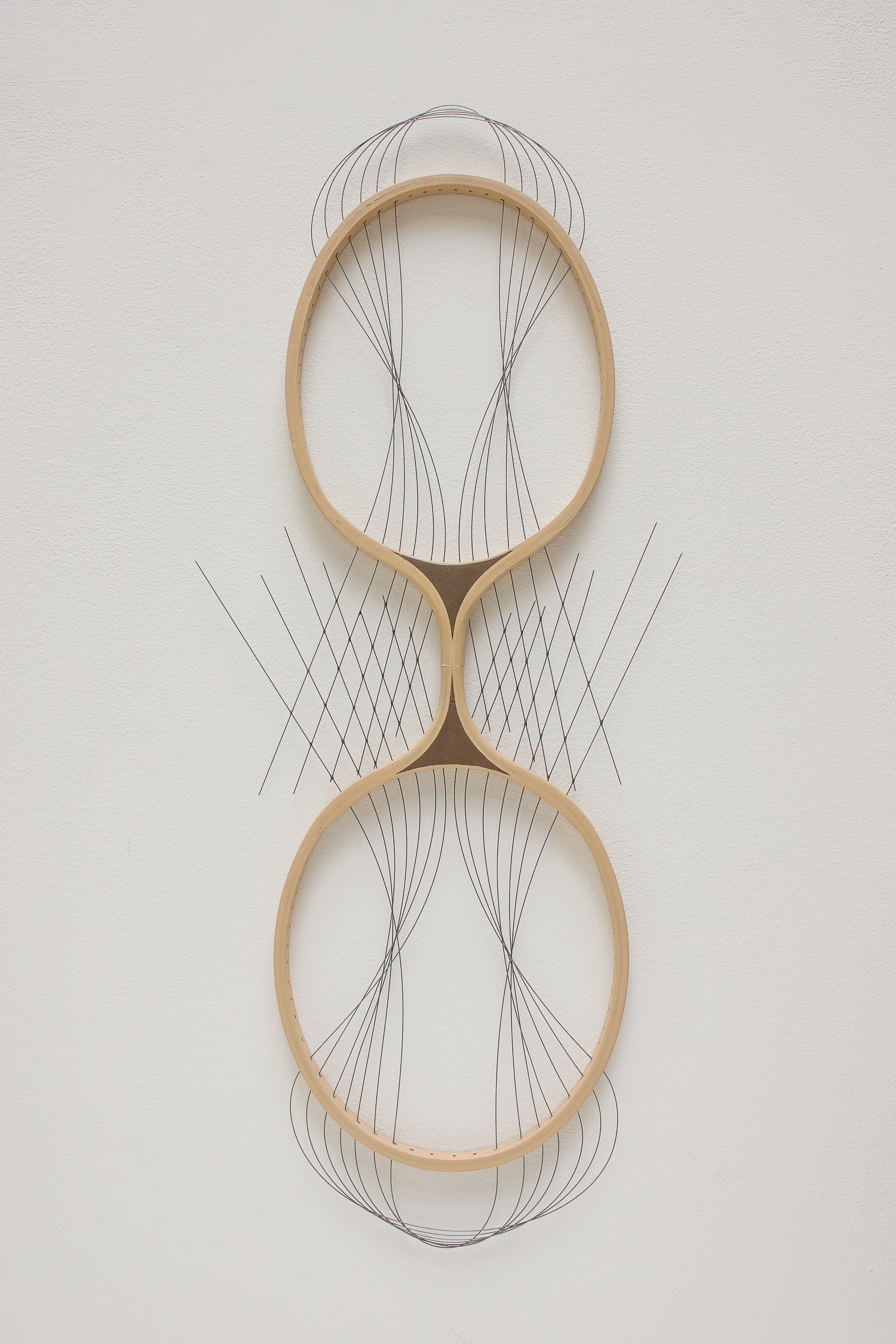   Instrument  Badminton rackets, piano wire, acrylic, adhesive 26" x 10" x 1" / 2013 Private Collection 
