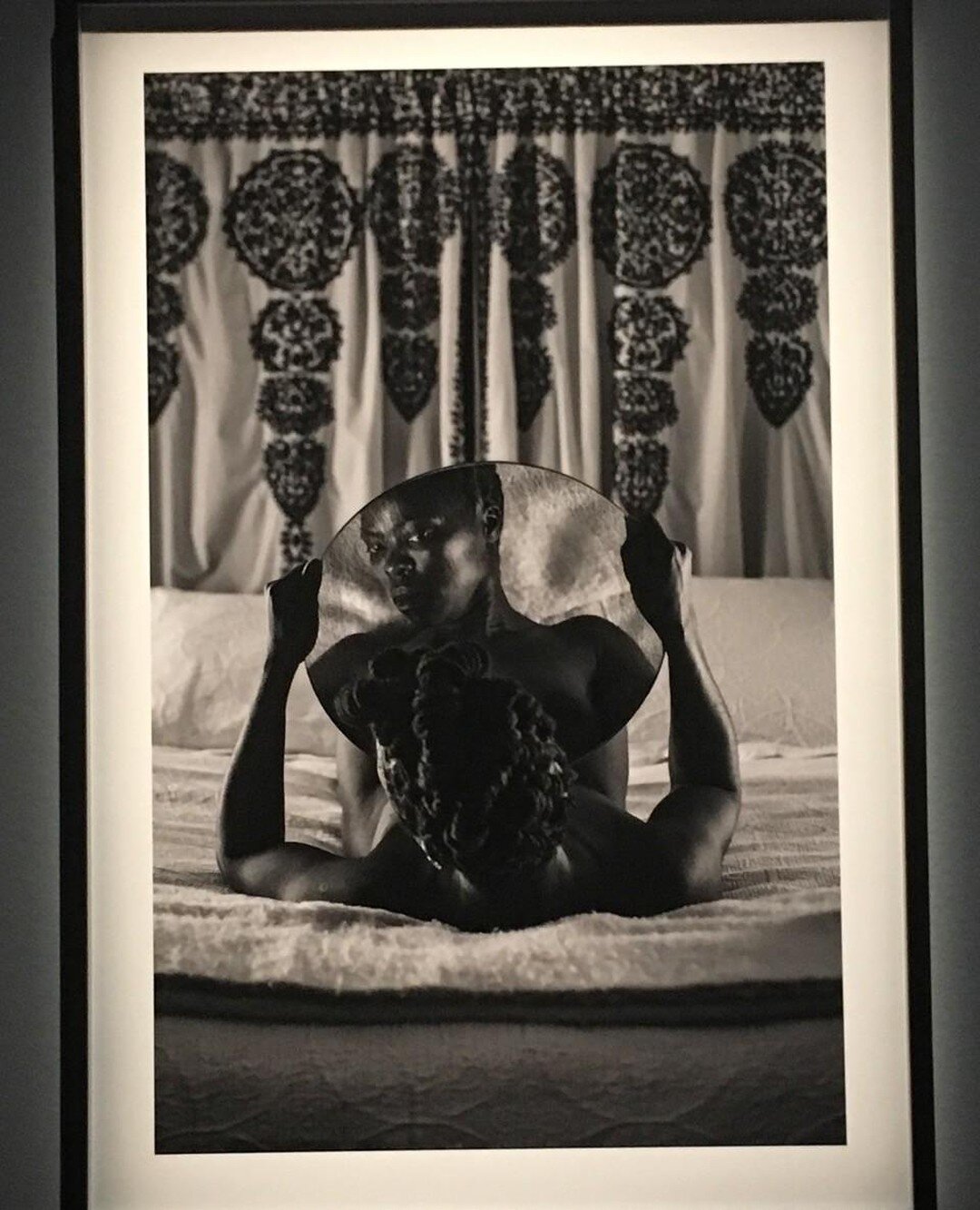 Mirror mirror on the wall...a modern version by Zanele Muholi, a south African visual activist and artist. #FEW, form of empowerment of women inkanyiso.org, #venice biennale, #form of empowerment of women, #love black and white photography⠀﻿
.⠀﻿
#ama