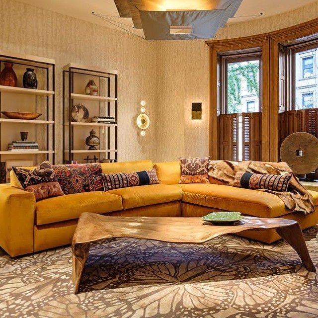 Living room designed by Amathea!  Monarch smoke #butterfly rug by #alexandermcqueen and #therugcompany, Banyan Coffee Table by #andriannashamaris, #milanosmartliving convertible sofa, Golden velvet fabric by #Jerrypair, Custom made pillows in ethnic 