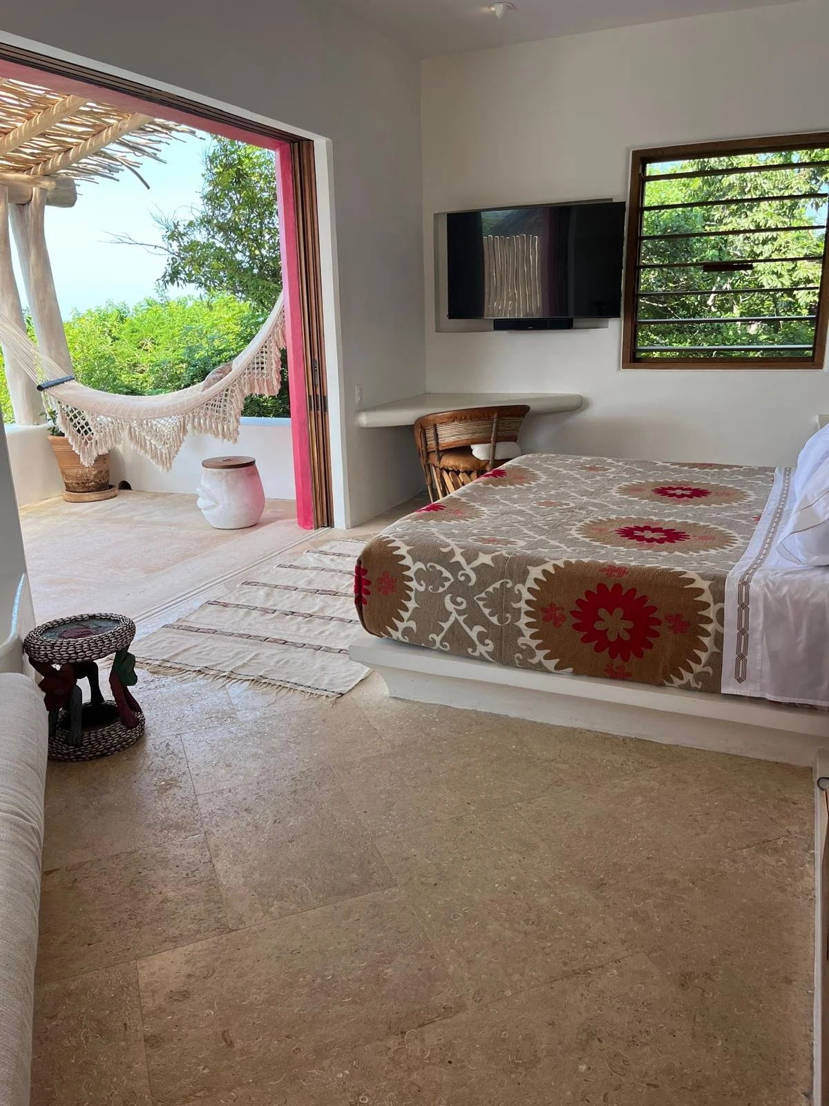 Sun suite terrace with a woven hammock and garden view, Casa Papelillo, Costalegre, interiors by Amathea