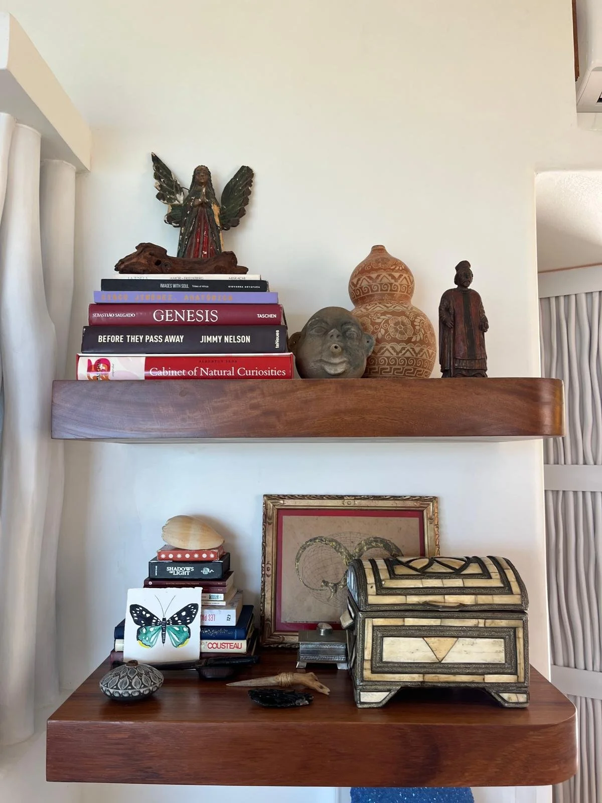 Floating wood shelves styled with books and collected objects, Casa Papelillo, interiors by Amathea