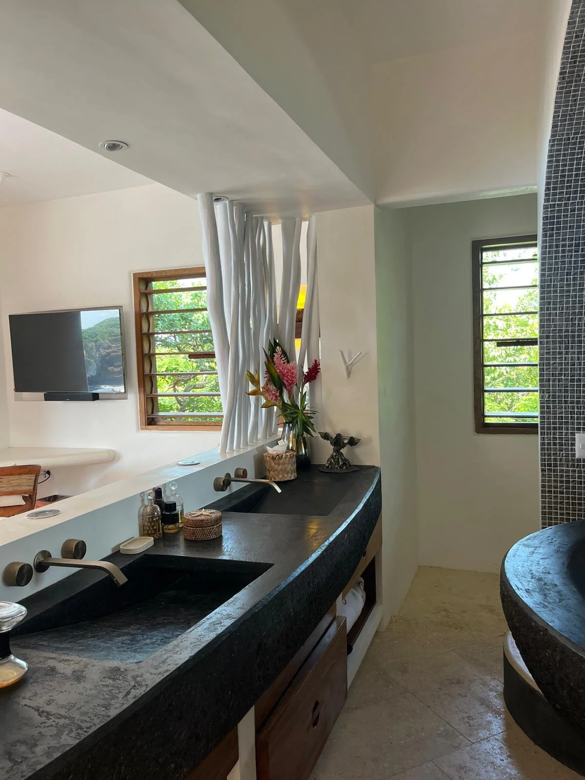 Dark stone vanity in the Sun suite bathroom, Casa Papelillo, Costalegre, interiors by Amathea