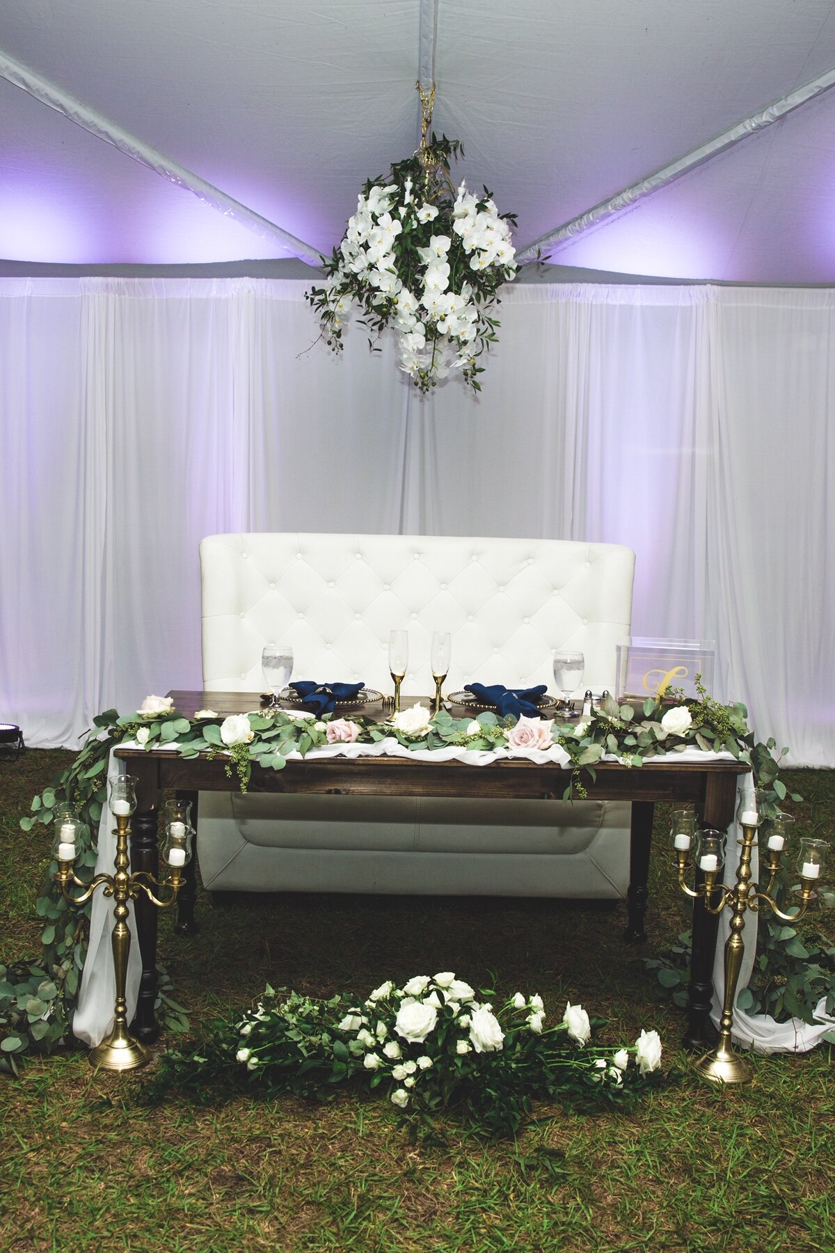 Sweetheart table with floral chandelier