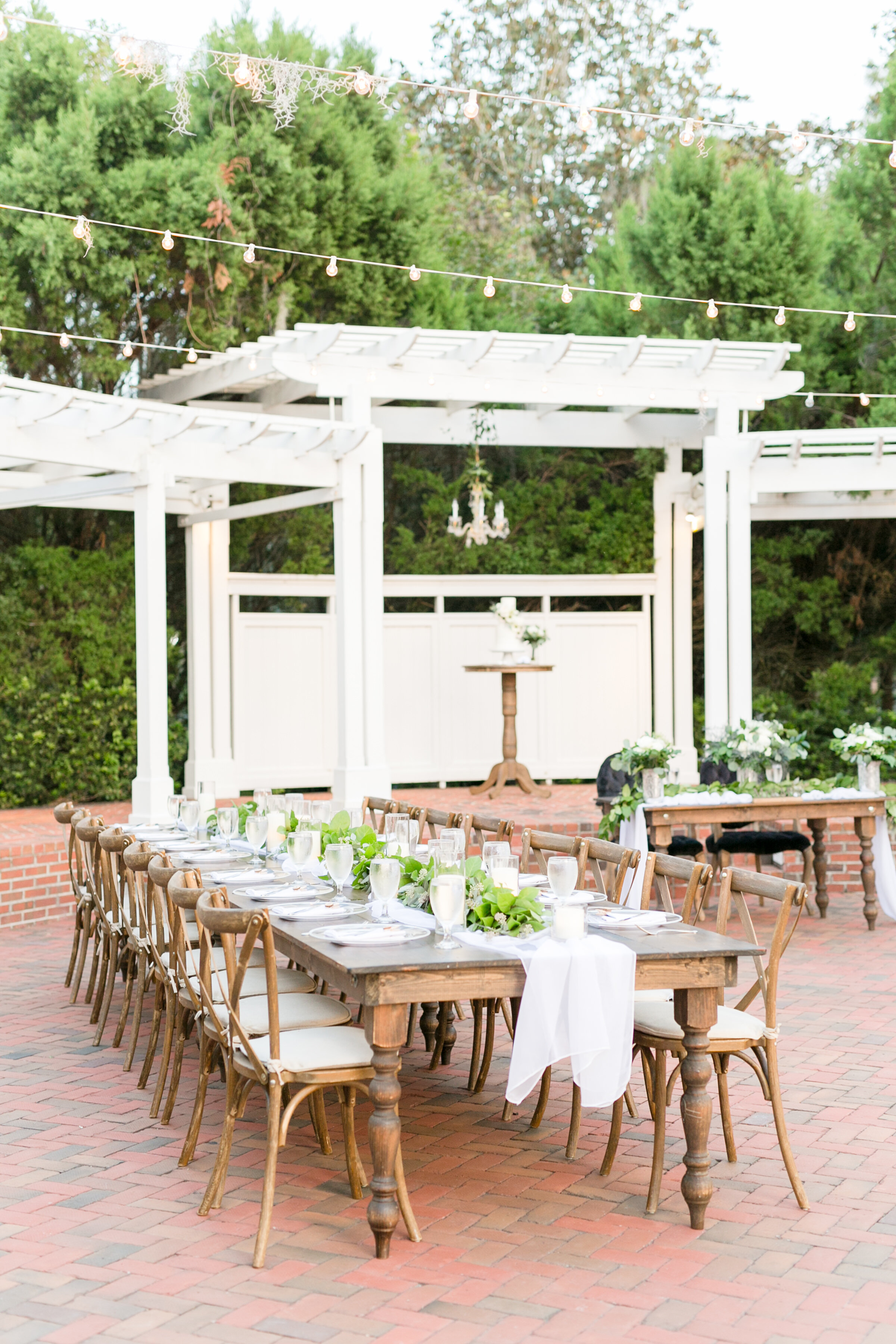 Bluegrass Chic - Black and White Wedding garland on farm tables with candles