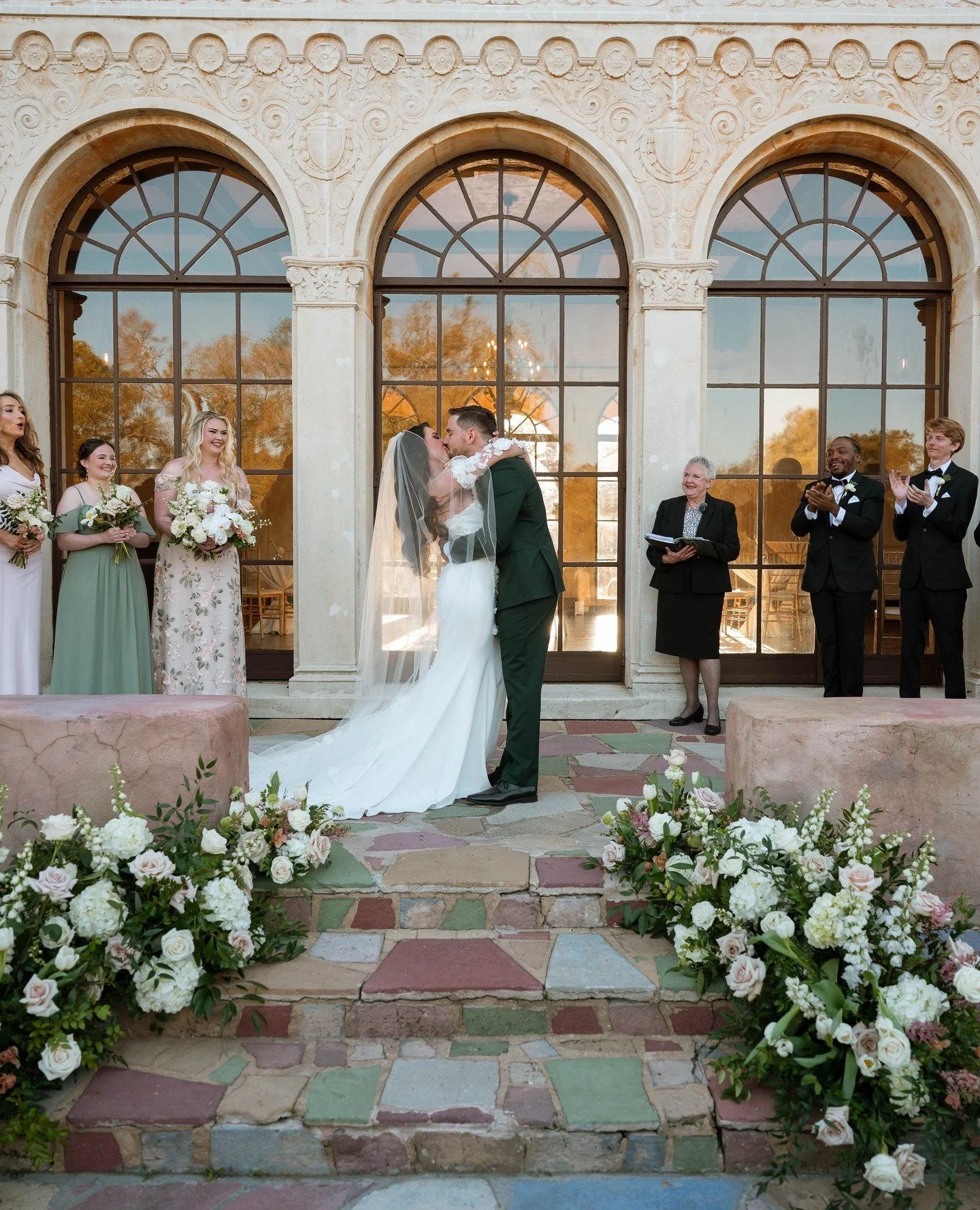the dreamiest ceremony @thehoweymansion 🕊️⁠
⁠
Swipe to see all of the gorgeous details of this sweet ceremony! The touches of warmth in the floral was the perfect complement for the stunning architecture of the venue!⁠
-⁠
-⁠
#weddingflowers #wedding