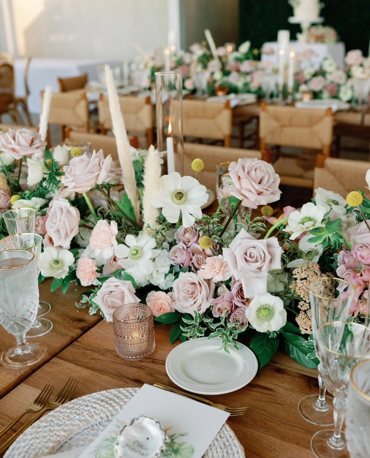 when all the details come together PERFECTLY!🫶🏻⁠
⁠
Swipe to check out this gorgeous reception space! ⁠
⁠
A mixture of long table with lush floral runner and round tables with elegant compote centerpieces was the perfect look!🤍⁠
-⁠
-⁠
#weddingflowe
