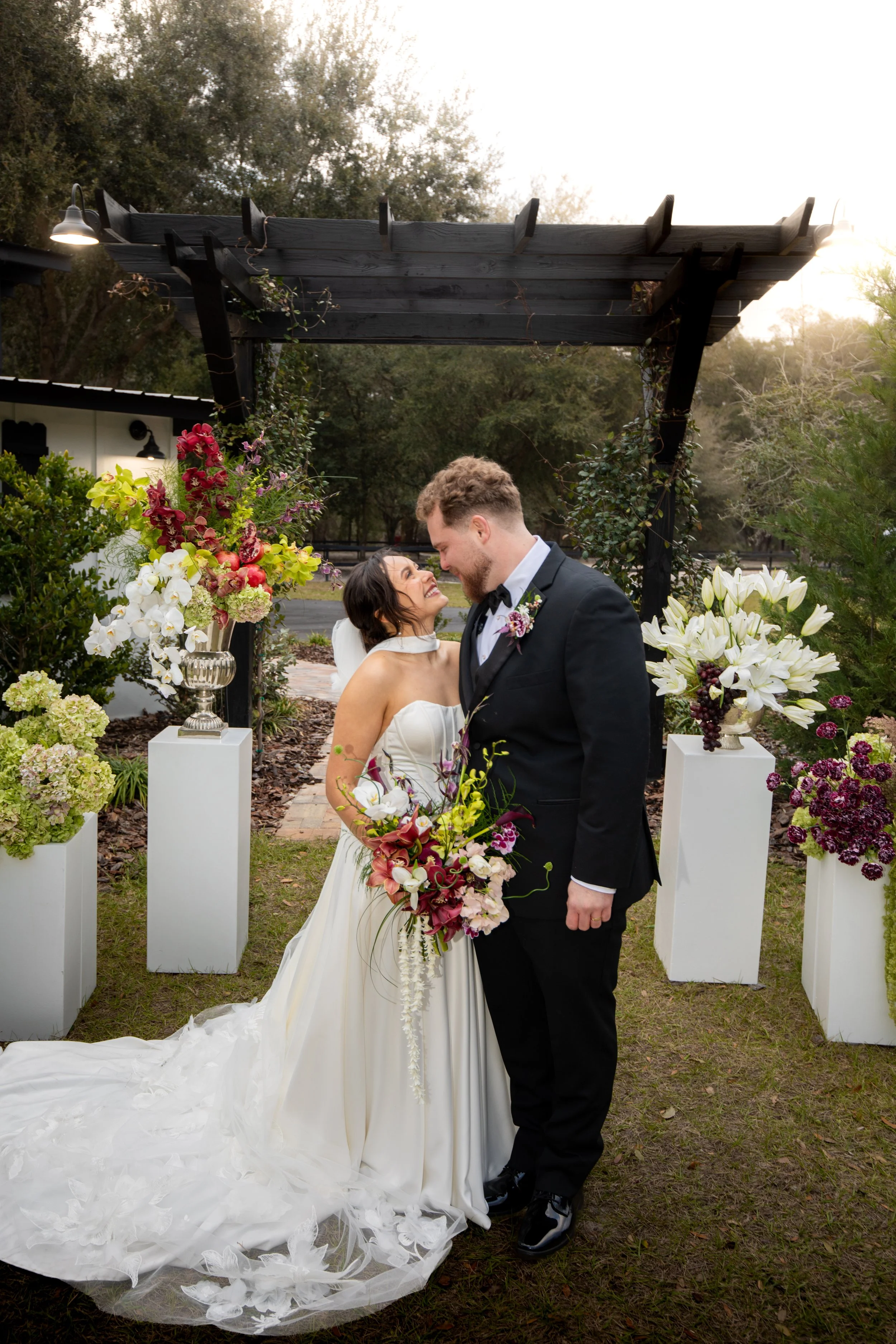 Modern Orchid Florals with a Moody Burgundy, Ivory, and Green Wedding Palette