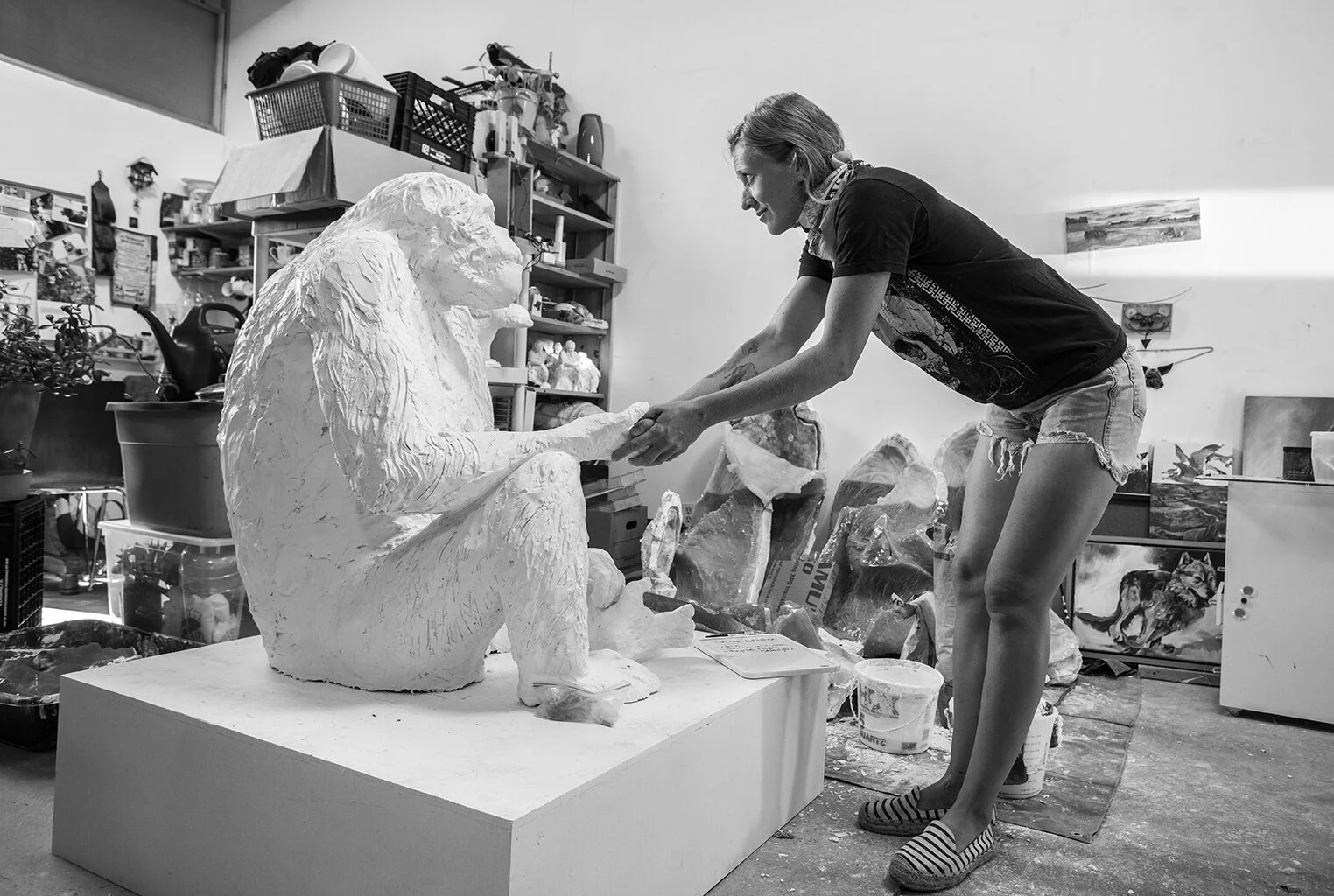 Rudolf in her studio with her sculpture Reciprocity.