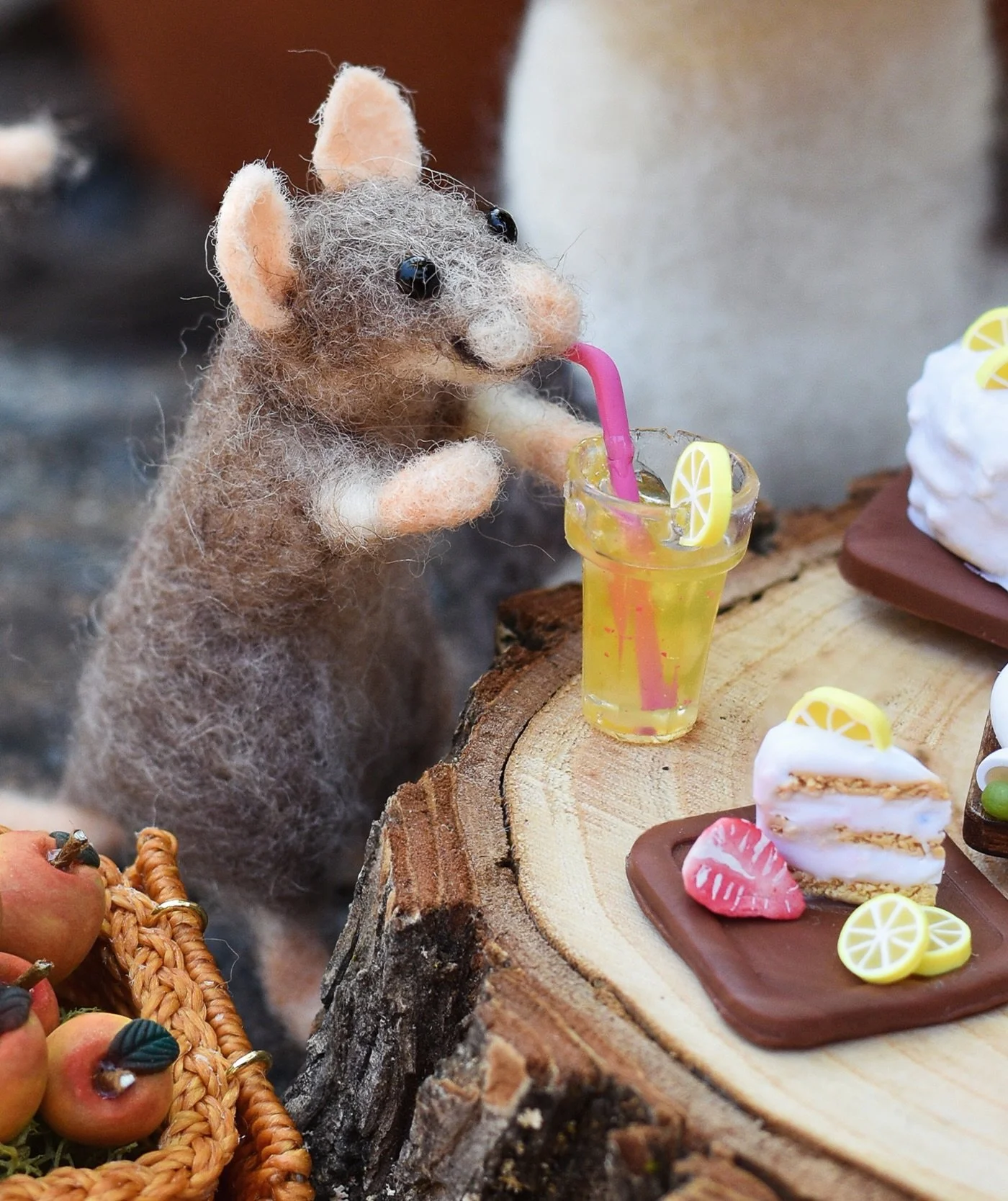 I had the pleasure of doing a collab with @rose_made_minis to create a tiny critter picnic featuring some of my felted figures and their frankly INCREDIBLE miniature foods, basket &amp; bouquet. We had too much fun putting this together! What foods s