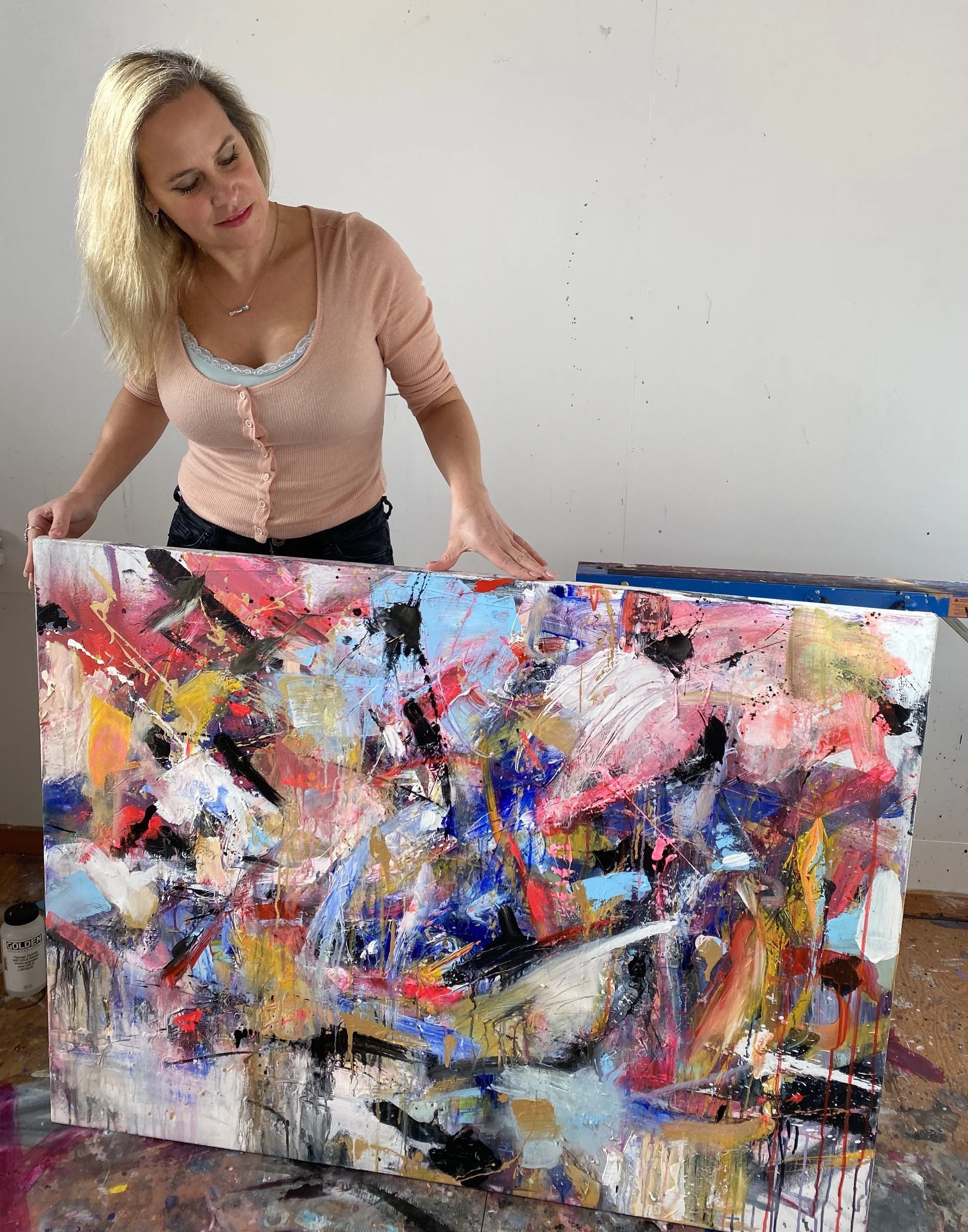 Studio view of painting "Neon Kiss"
