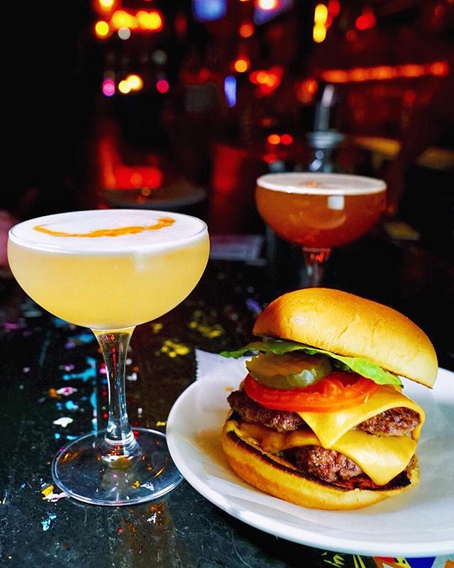 Happy belated #ThirstyThursday because last night I was too busy consuming these and watching gogo dancing at @ethylsalcoholnyc to post about it👯&zwj;♀️🍔🍹The double cheeseburger is pretty delicious, as well as the sleazy mustache cocktail which is