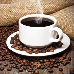 Cup-Of-Coffee-Coffee-Beans-31355126.jpg