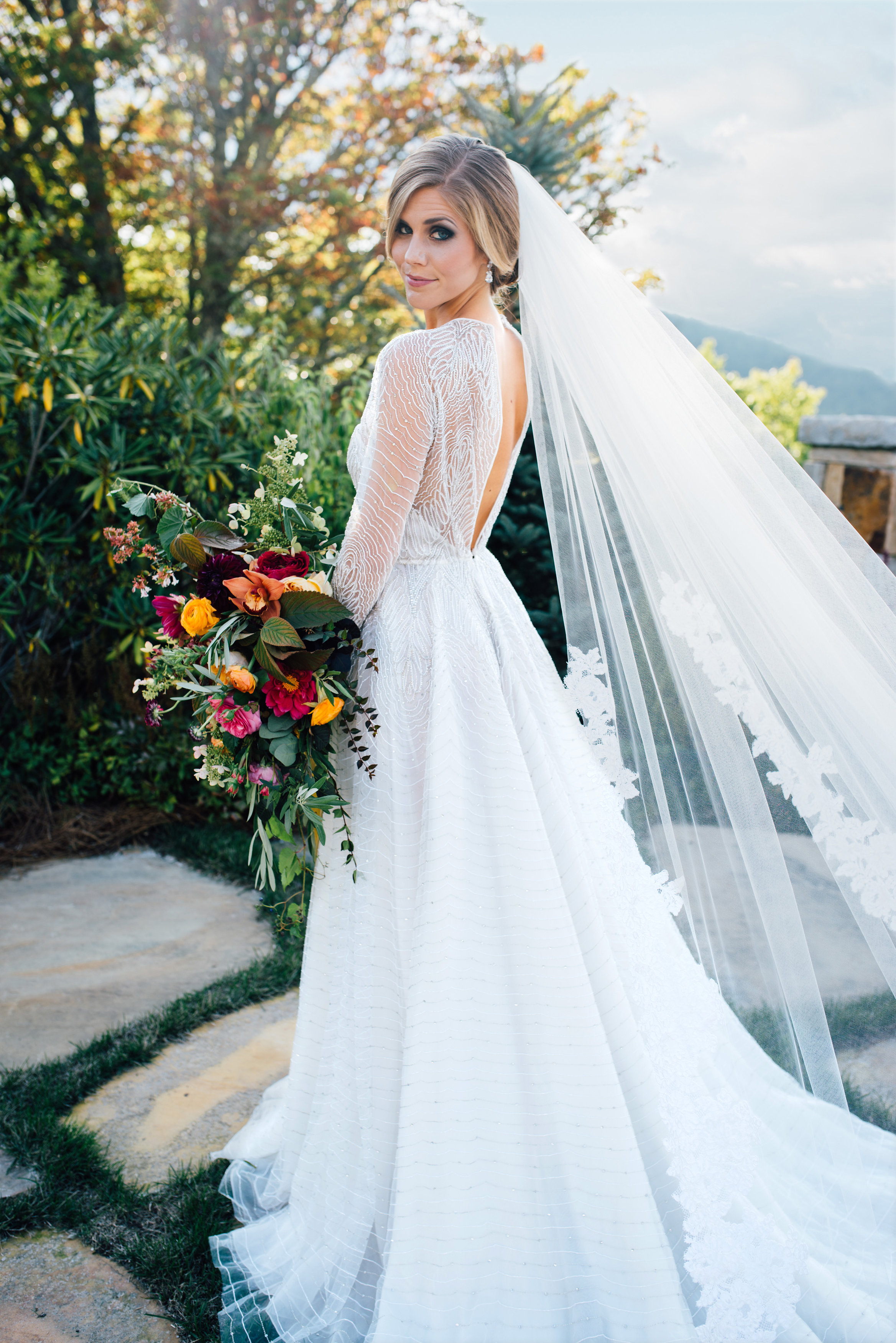 Game of Thrones Editorial Shoot by Whiskey & White Events. At the Old Edwards Inn in Highlands, NC. Photo by Cameron Reynolds Photography Design & Styling by Whiskey & White Events Models are Austin Boatwright Brides Dress is Washington by Naeem Khan Bridal Bouquet by Floressence Flowers Hair and Makeup by Canvas Boone Jewelry by Samantha Willis Bridal