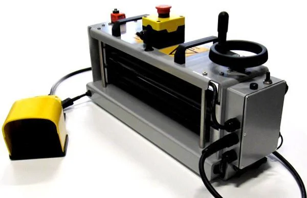 Portable Wet-Out This portable wet-out table makes the impregnation of epoxy resin into our liners easy and manageable as it can be used stand alone or mounted in our trenchless trailer packages. Perfect for lining from small or hard to reach locations. Complete with high-precision thickness gauge, reversible rollers, and speed control.