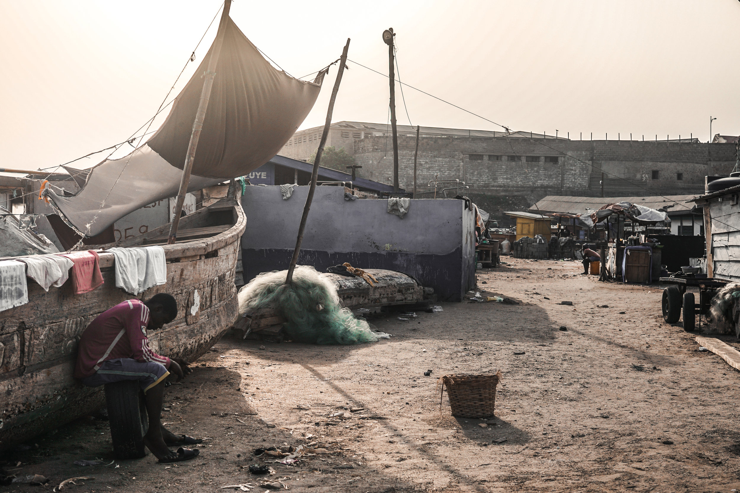  Outside center Accra lies a long established fishing community,  Jamestown . Everything feels different about this area. As if each building and the individual faces have their own narrative; an area permeated with a dark history of slavery, colonia