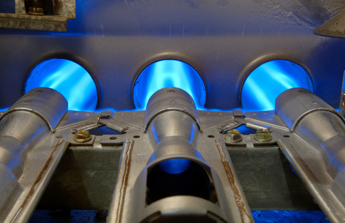 Inside-a-home-natural-gas-furnace-showing-blue-jets-of-fossil-fuel-burning..jpg