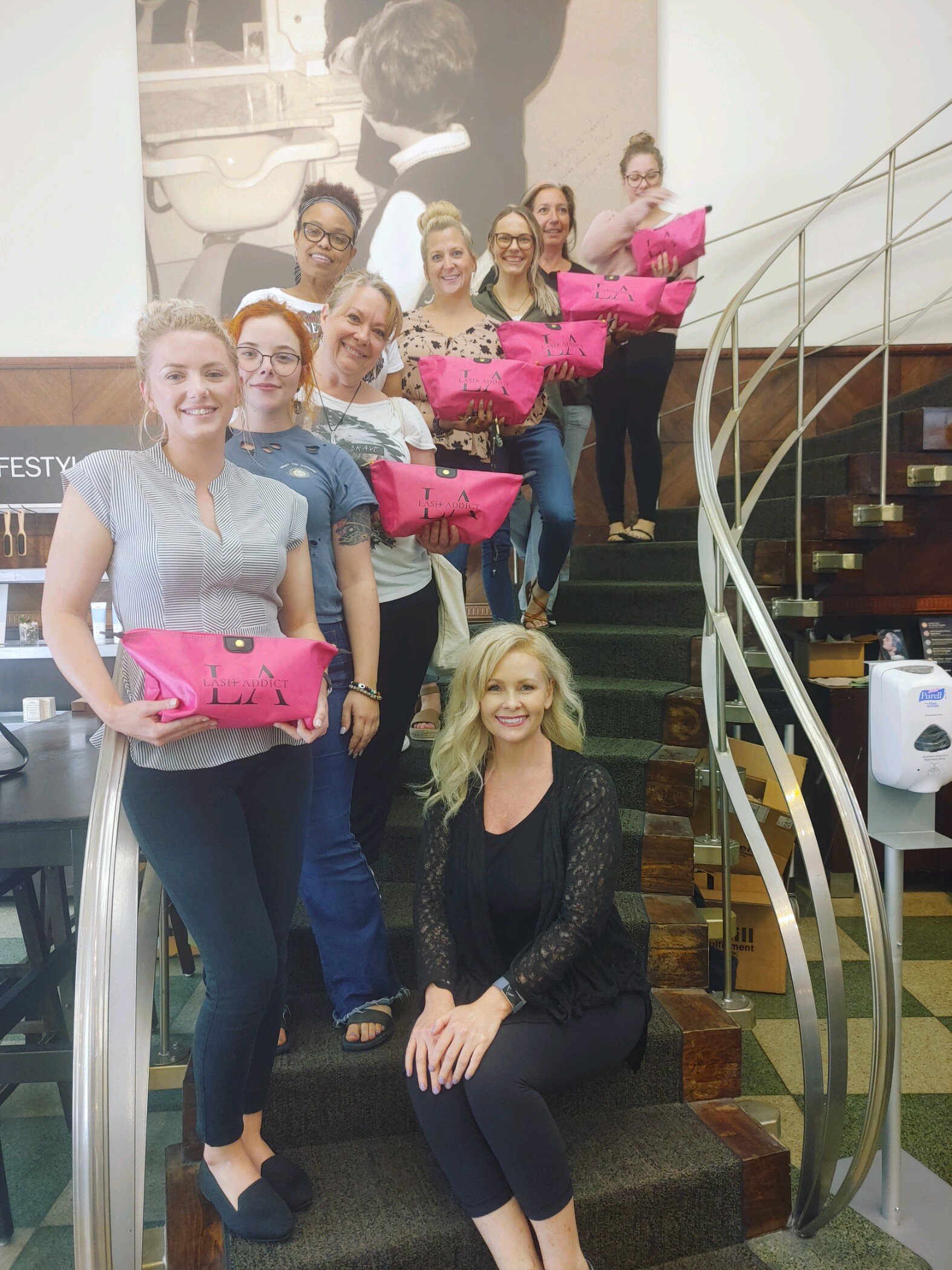 Suzanne training a Classic course with educators at Douglas J Aveda Knoxville