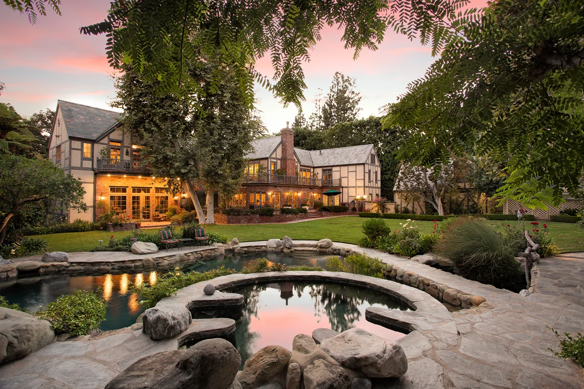 1006 North Rexford Drive | Beverly Hills Listed at $32,000,000 Magnificently remodeled Estate in Beverly Hills . An exquisite blend of old-world Tudor architecture and French Country design. Located among the most prestigious estates north of Sunset Boulevard in Beverly Hills. This restored 1923 compound, the former home of Harry Warner, founder of Warner Bros. Studios, offers a rich and enchanting lifestyle and the best of Hollywood glamour and history.