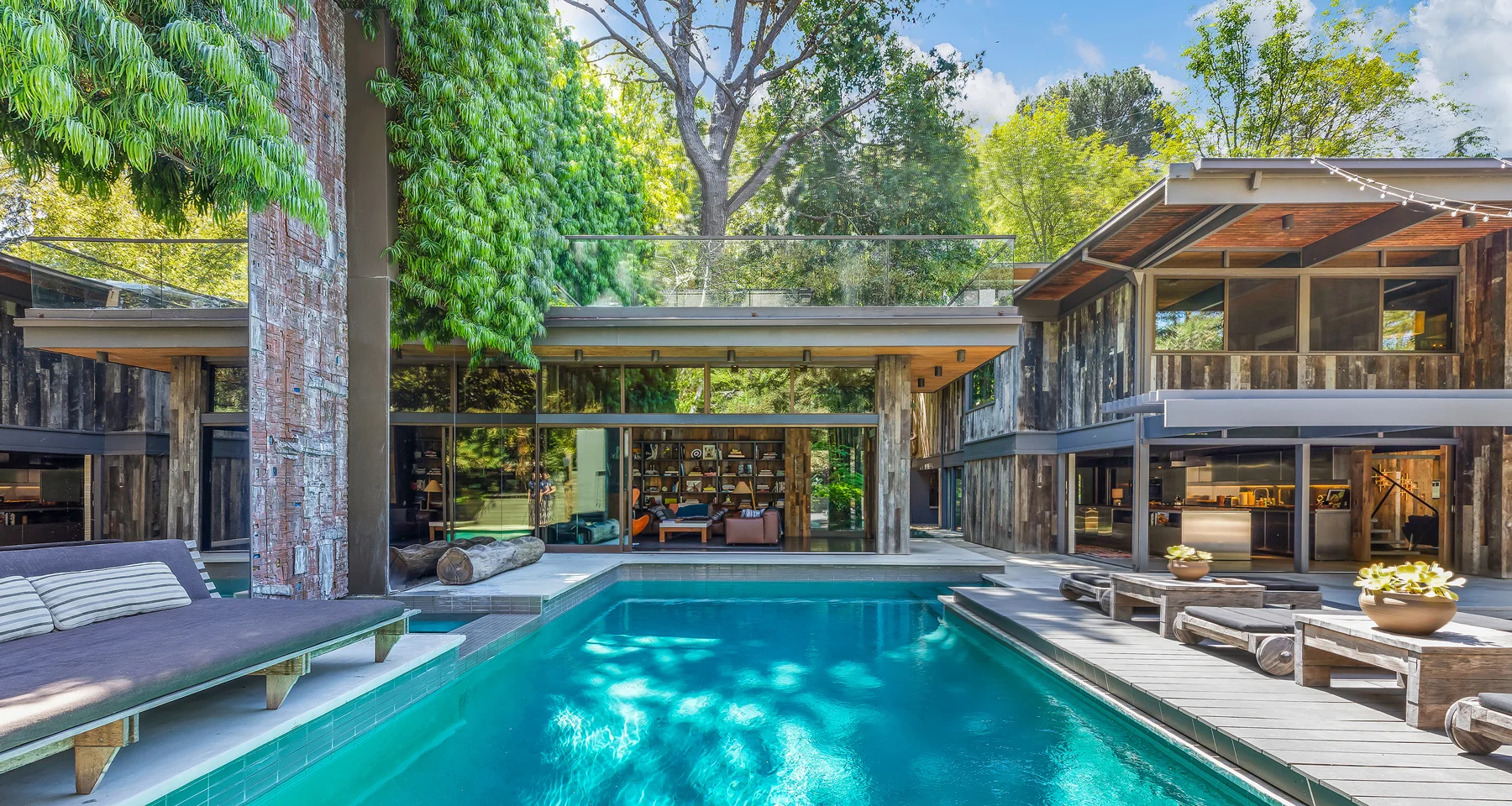 2563 Nichols Canyon Rd | Hollywood Hills Offered at $6,995,000 The Ajioka House, 1960 by famed architects, Buff & Hensman. A post & beam masterpiece, generously sited on nearly an acre of lush landscaping with complete privacy.