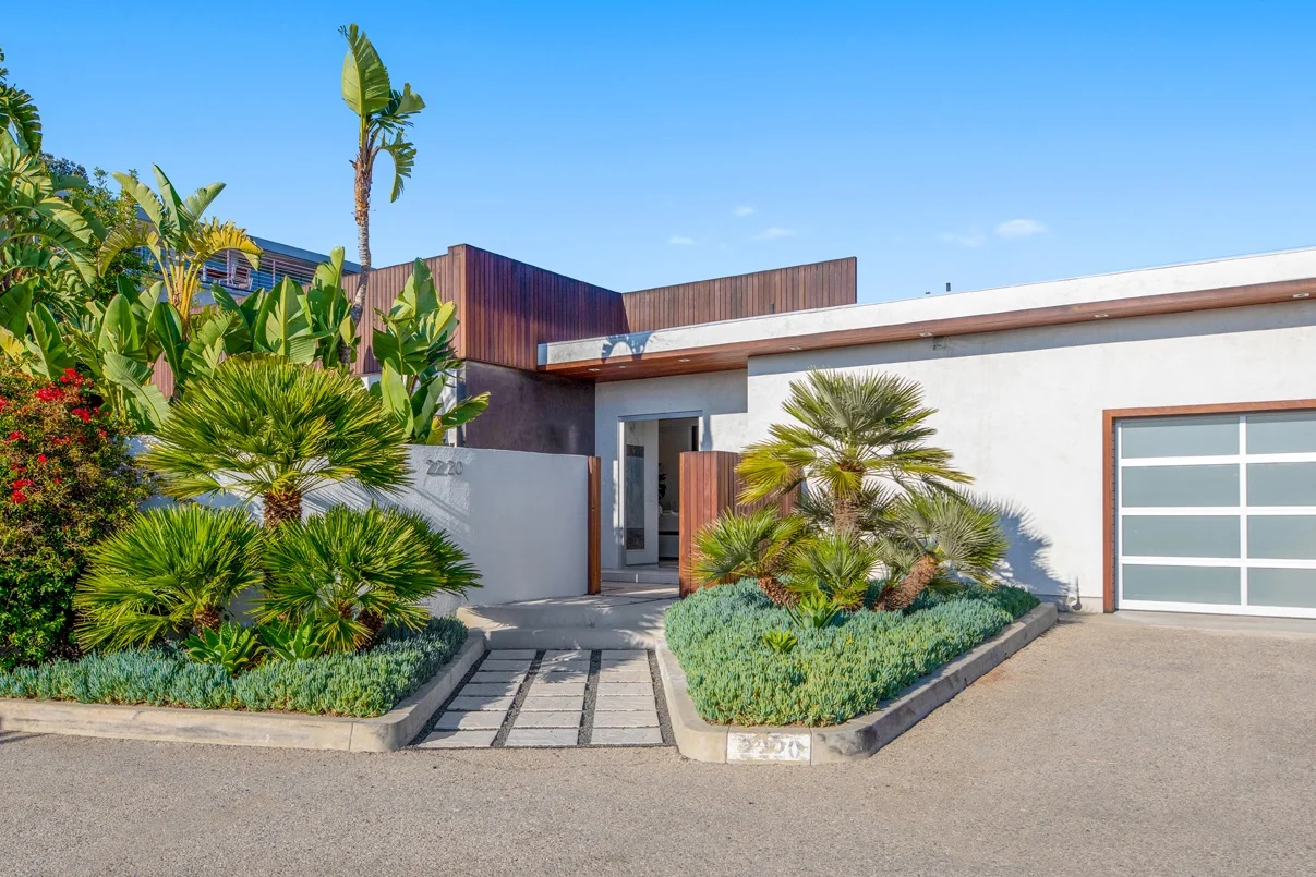 2220 Astral Place | Hollywood Hills Listed at $2,695,000 Sleek Modern Home with Pool and Panoramic Views of the City and Runyon Canyon. Gorgeous Contemporary 3 bedroom, 3 ½ bath home with office. Open floor plan with retractable Fleetwood doors that create the quintessential indoor/outdoor LA living experience. Bright living room with stunning porcelain tile flooring. Italian Effeti kitchen with top-of-the-line appliances and bold island. Large dining area. Teak deck designed for entertaining and for observing the sweeping views. Master suite with hardwood floors, beautiful bath and fantastic closet. There are two additional bedroom suites. Sparkling pool. Located on a quiet cul de sac with hiking trails conveniently located nearby. 2-car Garage. The ultimate Hollywood lifestyle!